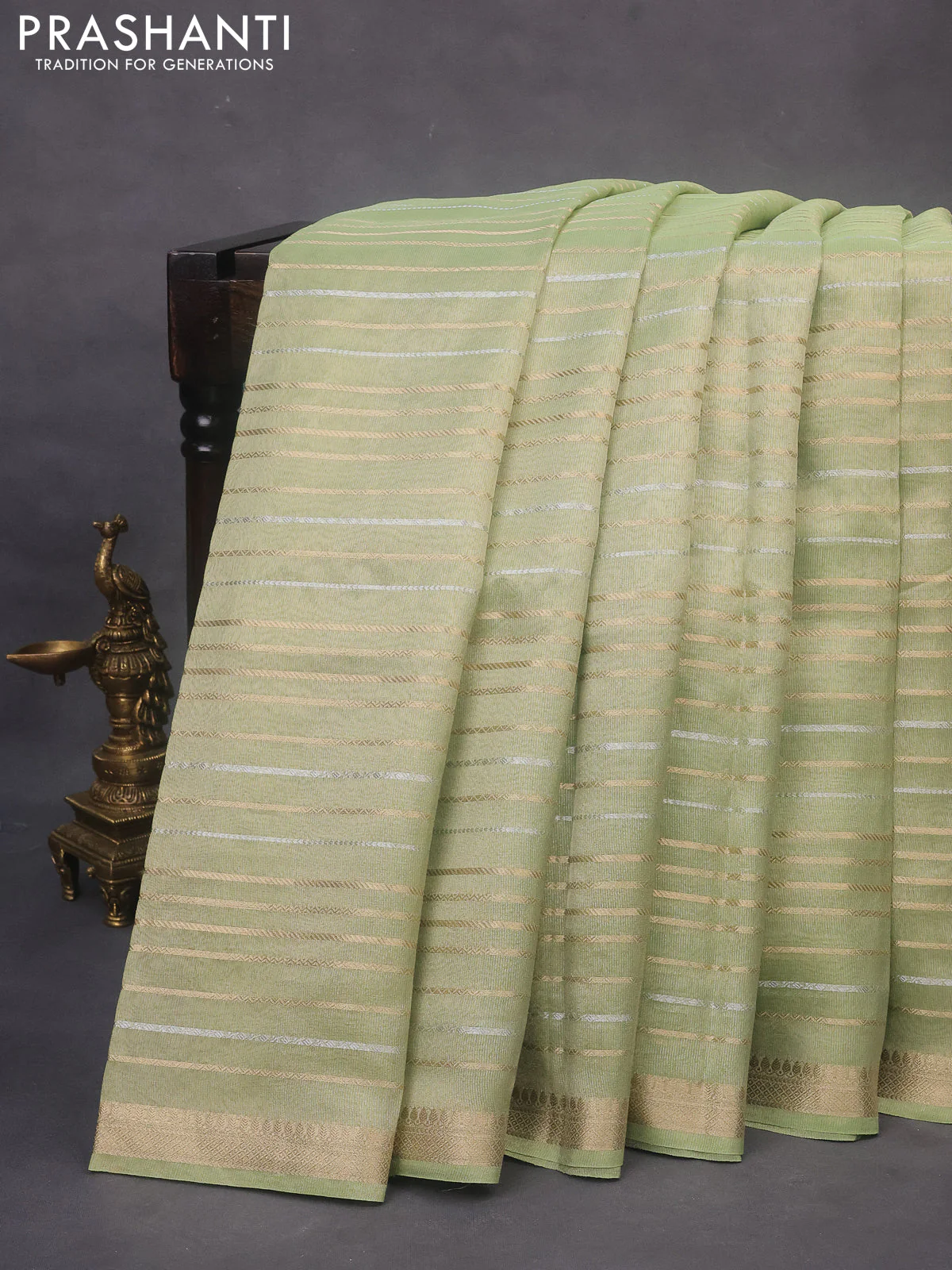 Tissue organza saree pista green with allover silver & gold zari weaves and zari woven border - Image 2
