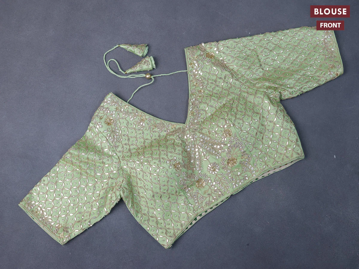 Tissue organza saree pista green with allover silver & gold zari weaves and zari woven border - Image 4