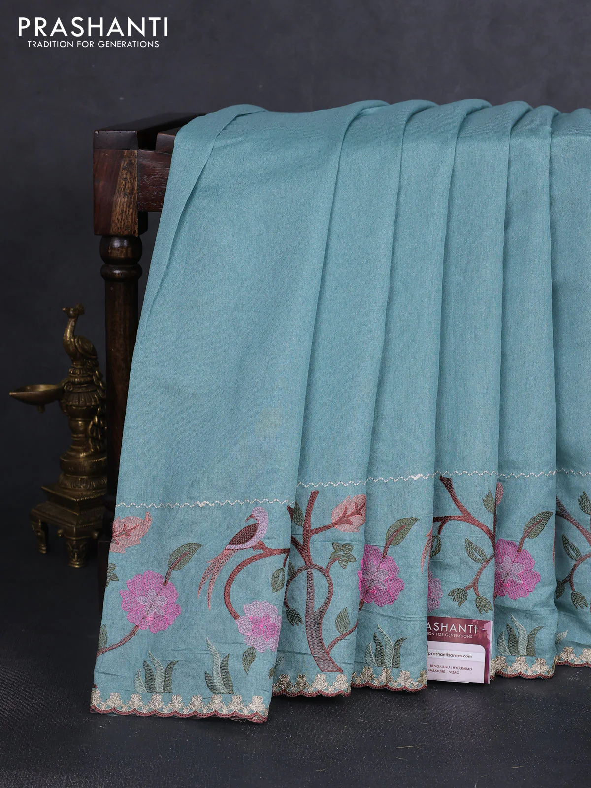 Tissue organza saree teal blue with plain body and embroidery border