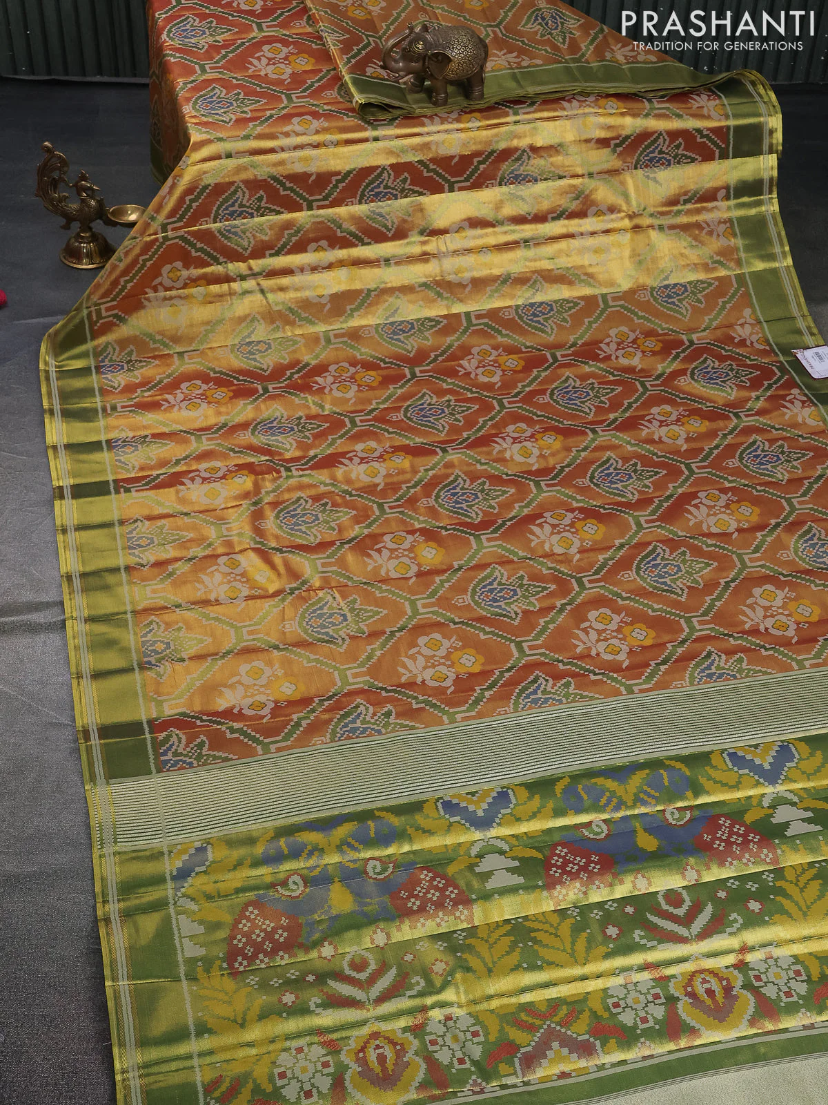 Tissue paithani saree dual shade of gold and green with allover ikat thread weaves and rettapet border - Image 2