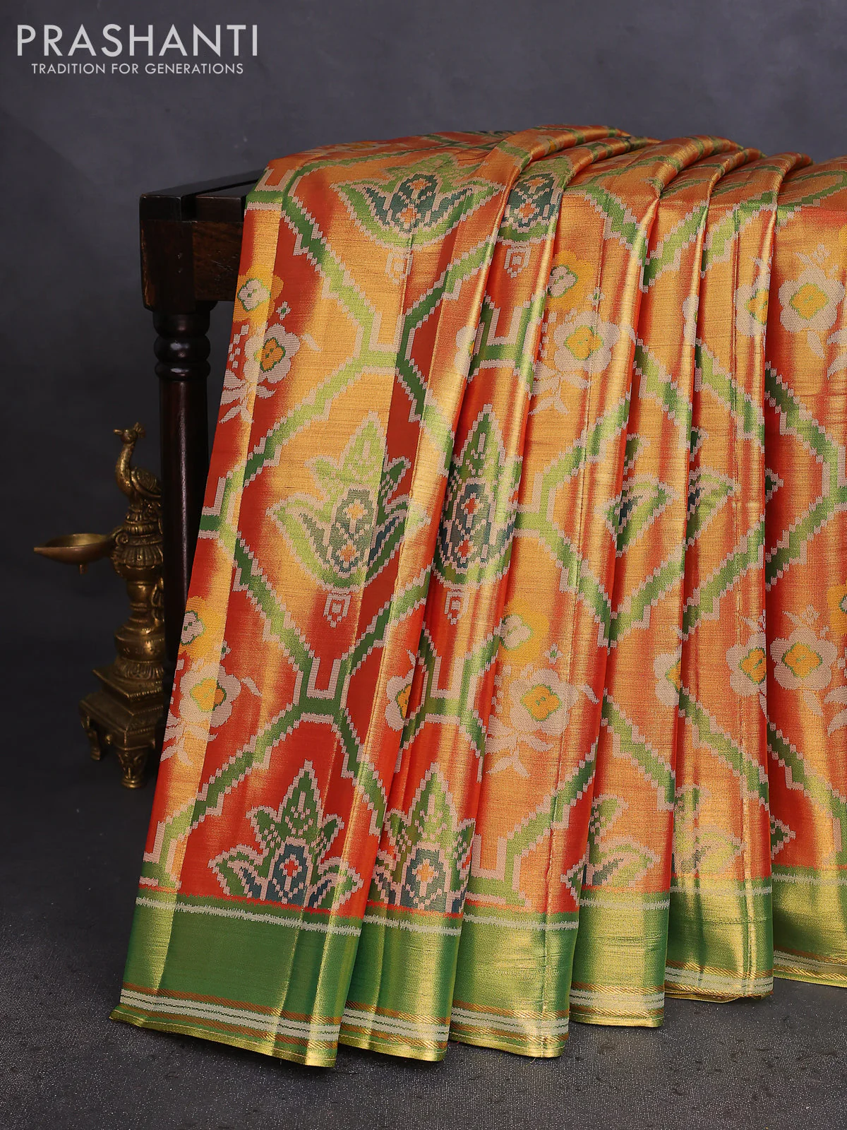 Tissue paithani saree dual shade of reddish gold and green with allover ikat thread weaves and rettapet border
