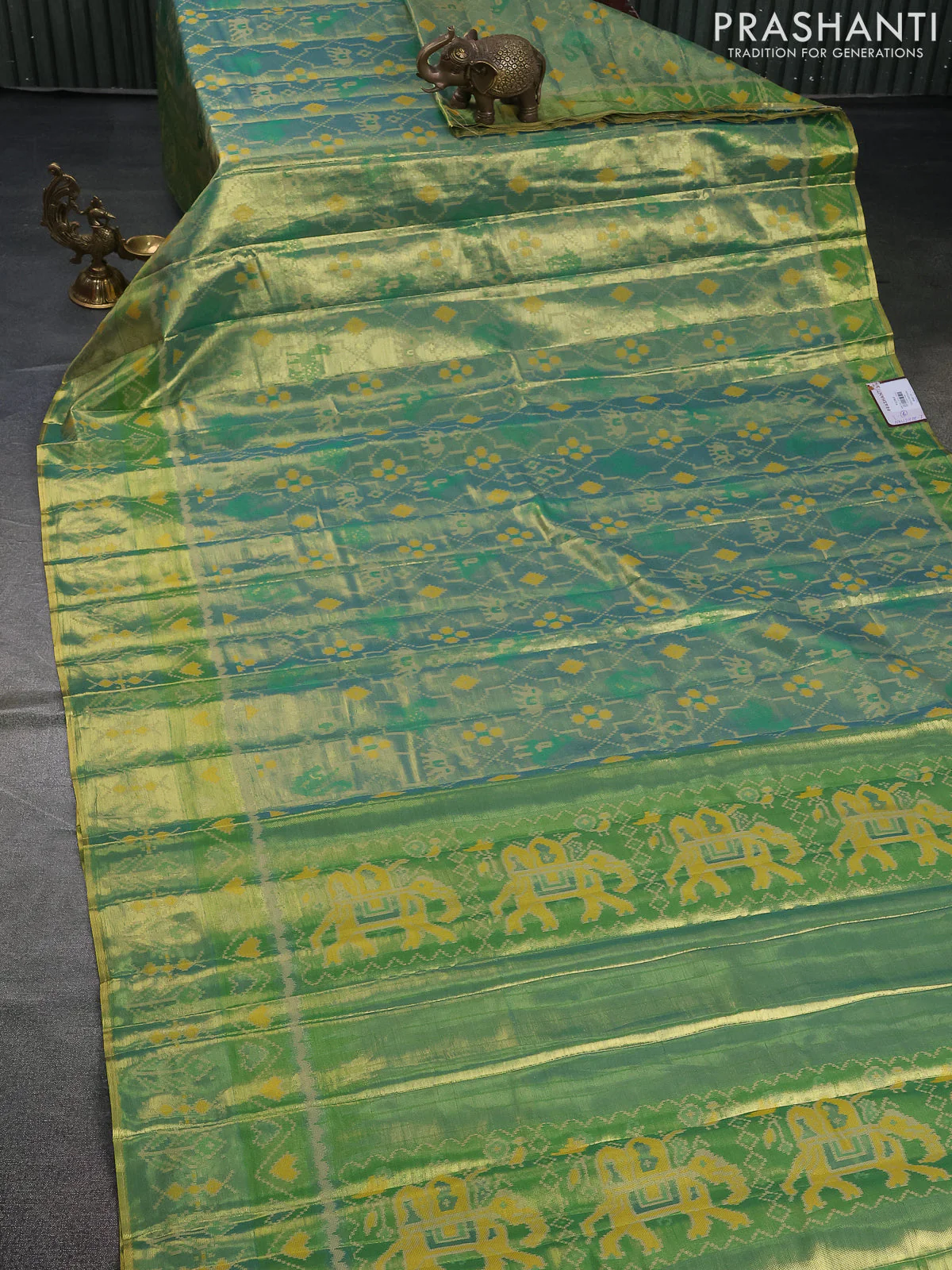 Tissue paithani saree dual shade of teal blue and green with allover ikat thread weaves and paithani style border - Image 2