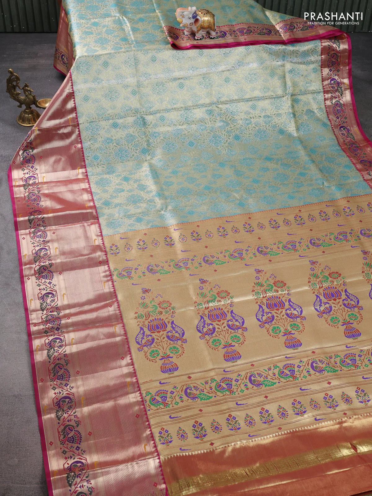 Tissue paithani silk saree dual shade of green and magenta pink with allover zari woven brocade weaves and long zari woven paithani style border - Image 2