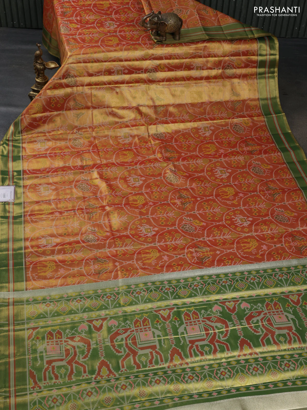 Tissue paithani silk saree dual shade of orange and mehendi green with allover patola weaves and zari woven border - Image 2