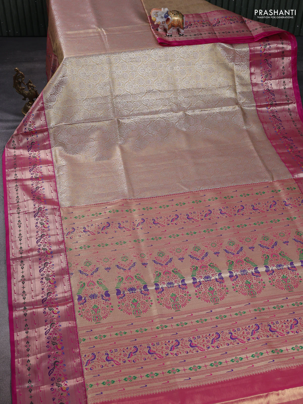 Tissue paithani silk saree dual shade of pastel peach and pink with allover silver zari woven brocade weaves and zari woven paithani style border - Image 2