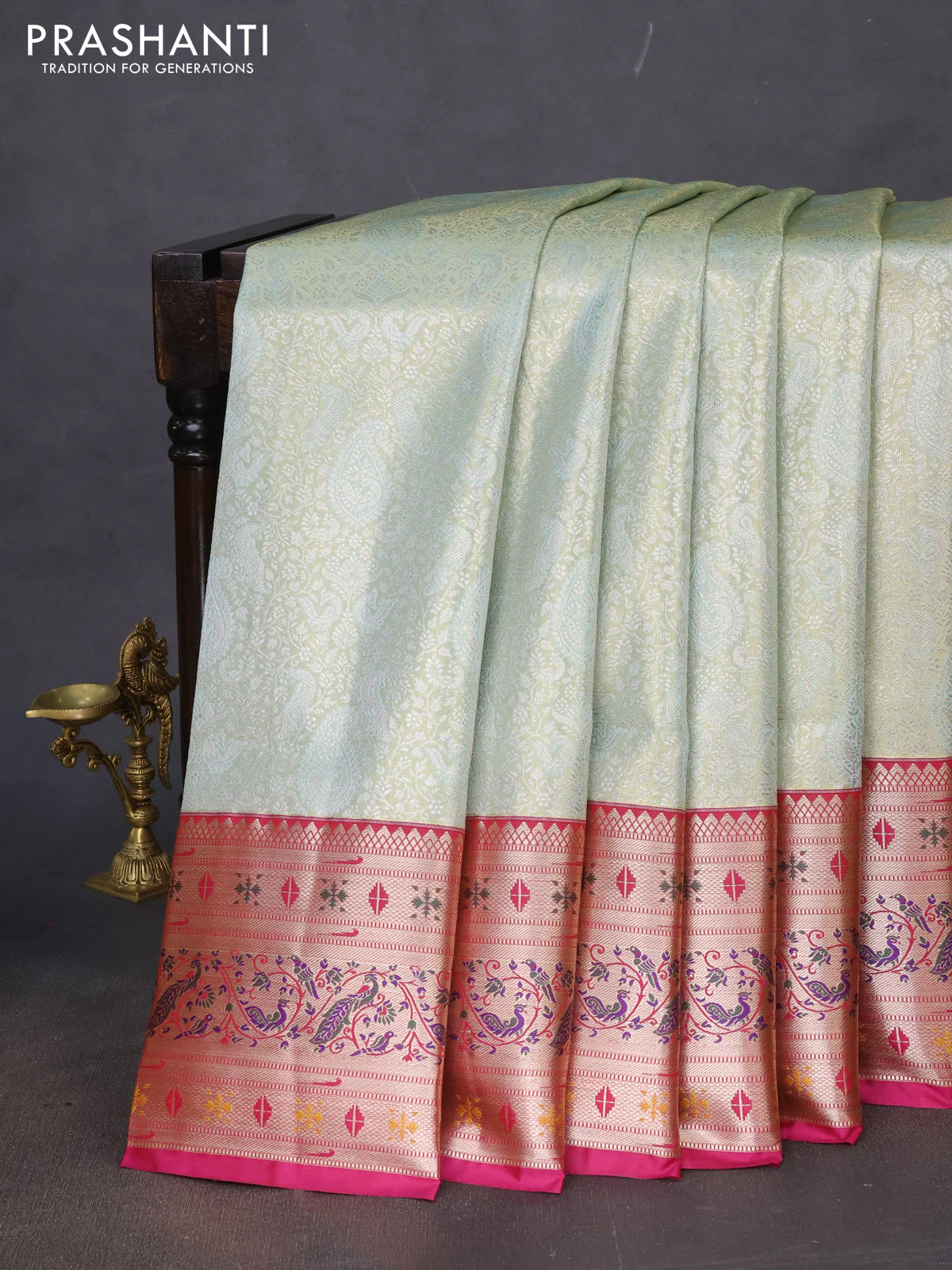 Tissue paithani silk saree pastel green and magenta pink with allover silver zari woven brocade weaves and zari woven paithani style border