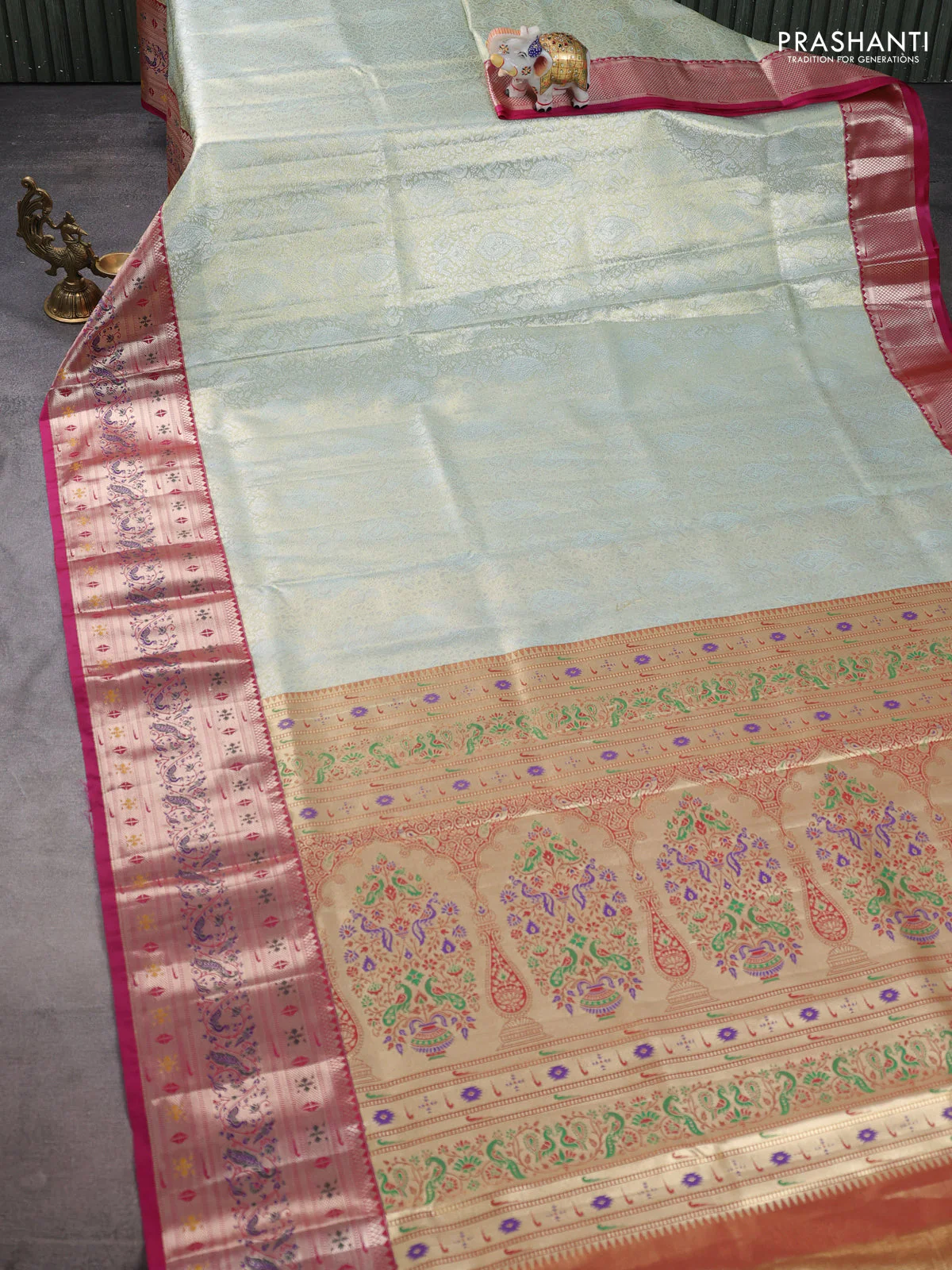 Tissue paithani silk saree pastel green and magenta pink with allover silver zari woven brocade weaves and zari woven paithani style border - Image 2