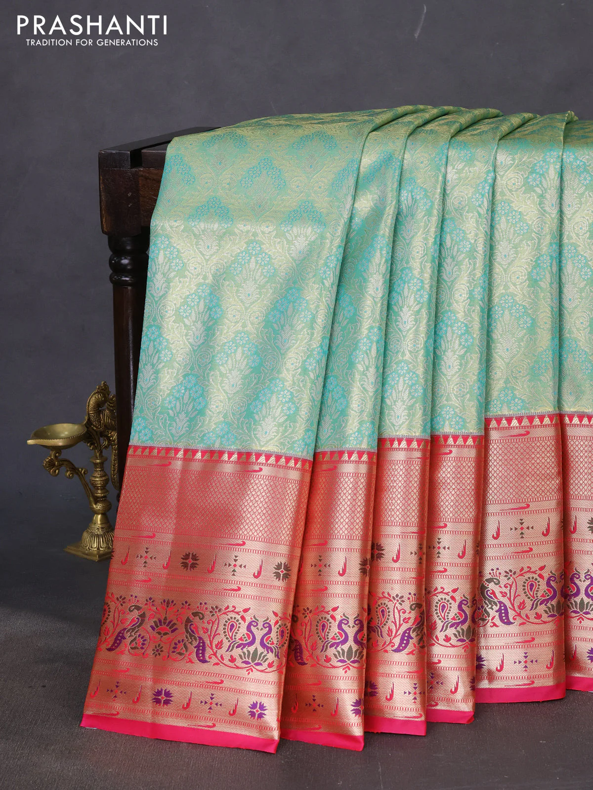 Tissue paithani silk saree teal shade and pink with allover zari woven brocade weaves and long zari woven paithani style border