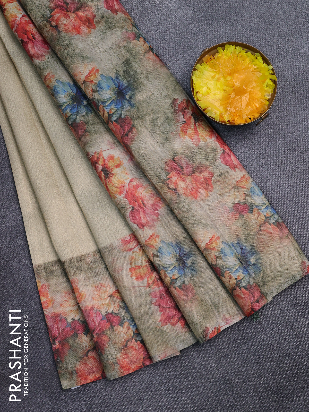 Tissue saree cream and pastel green with allover zari weaves and floral digital printed border