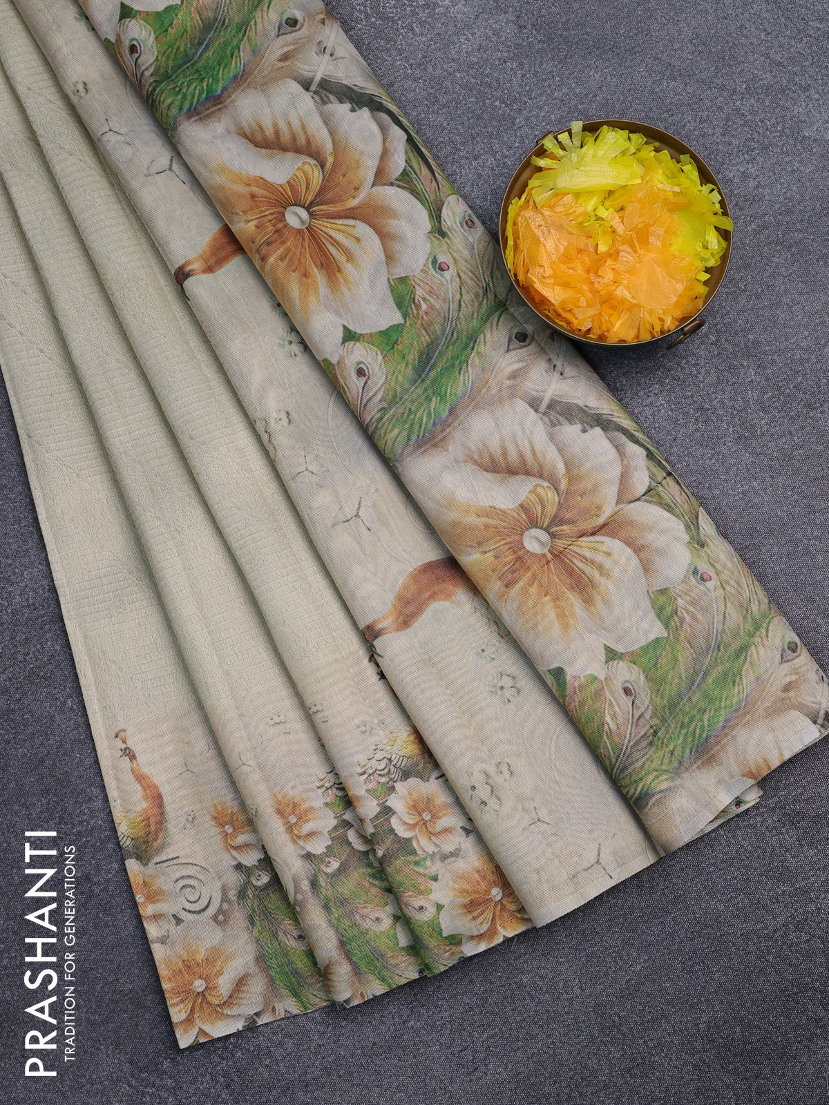 Tissue saree cream with allover zari weaves and floral digital printed border