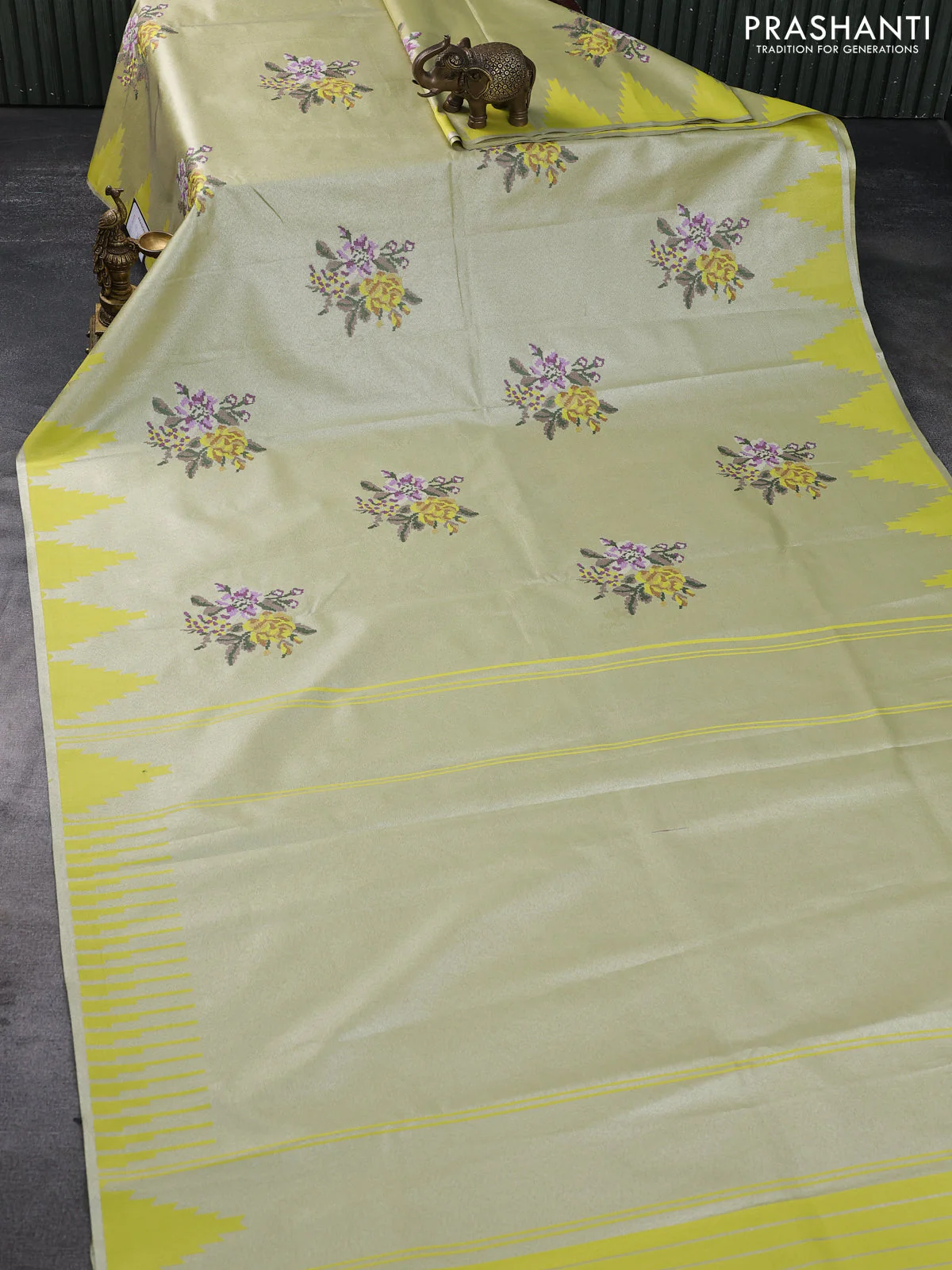 Tissue saree lime yellow with embroidery work buttas and temple design zari border - Image 2