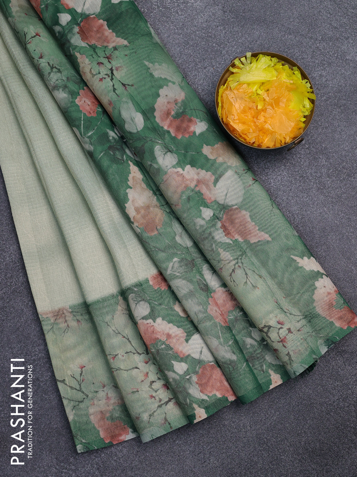 Tissue saree pastel green and green with allover zari weaves and floral digital printed border