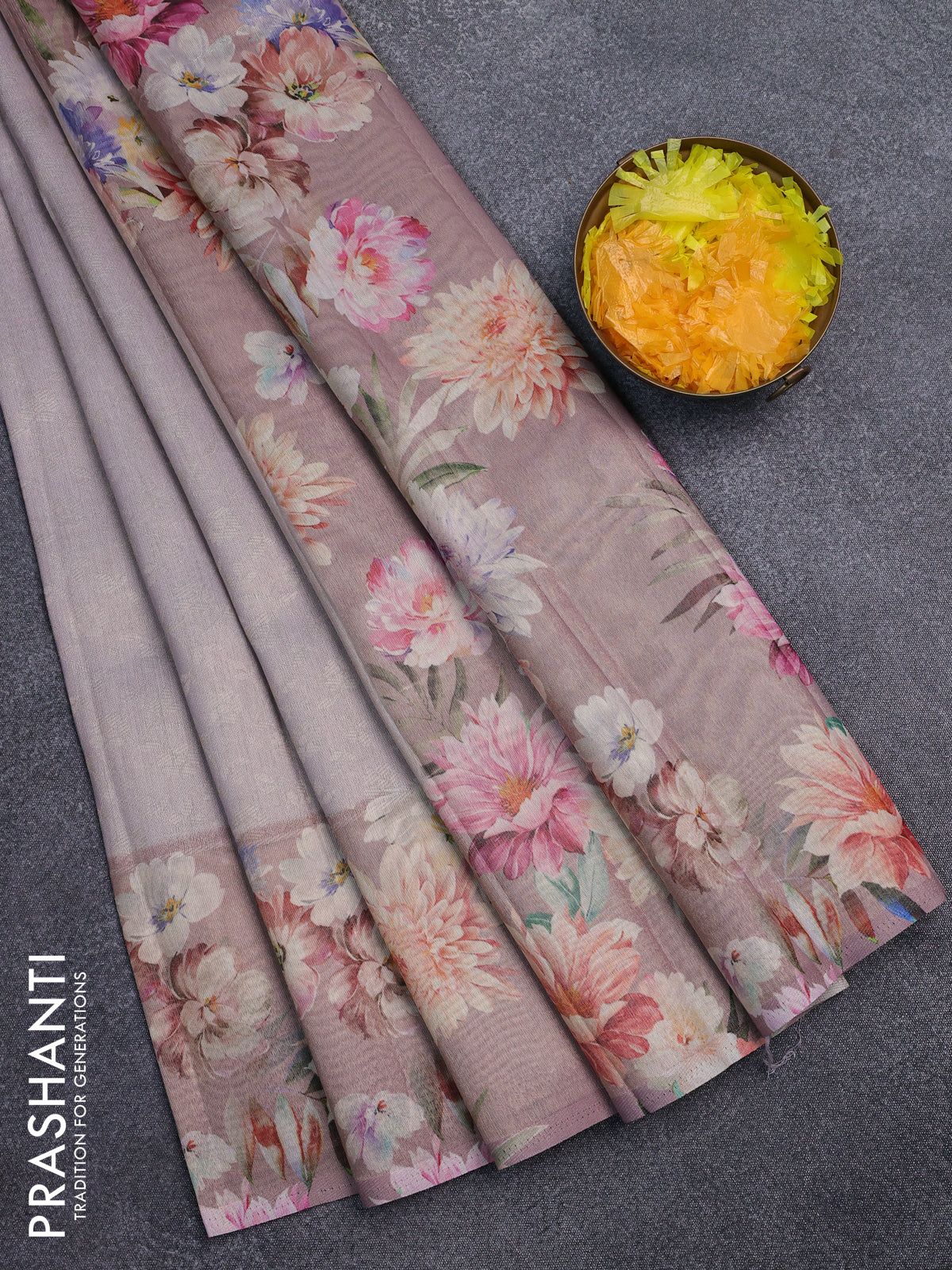 Tissue saree pastel lavender and pastel pink with allover zari weaves and floral digital printed border