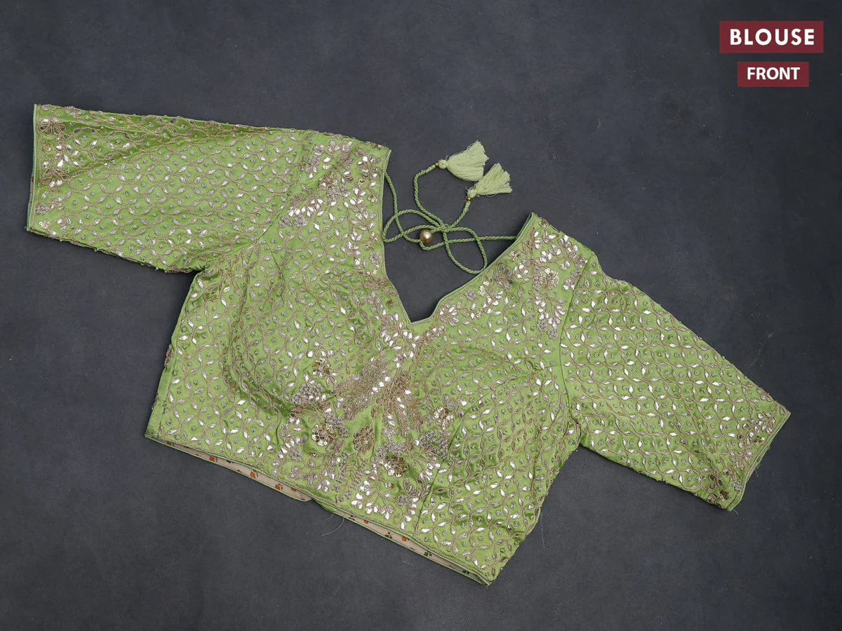 Tissue silk saree light green with allover silver & gold zari weaves and zari woven border - Image 3