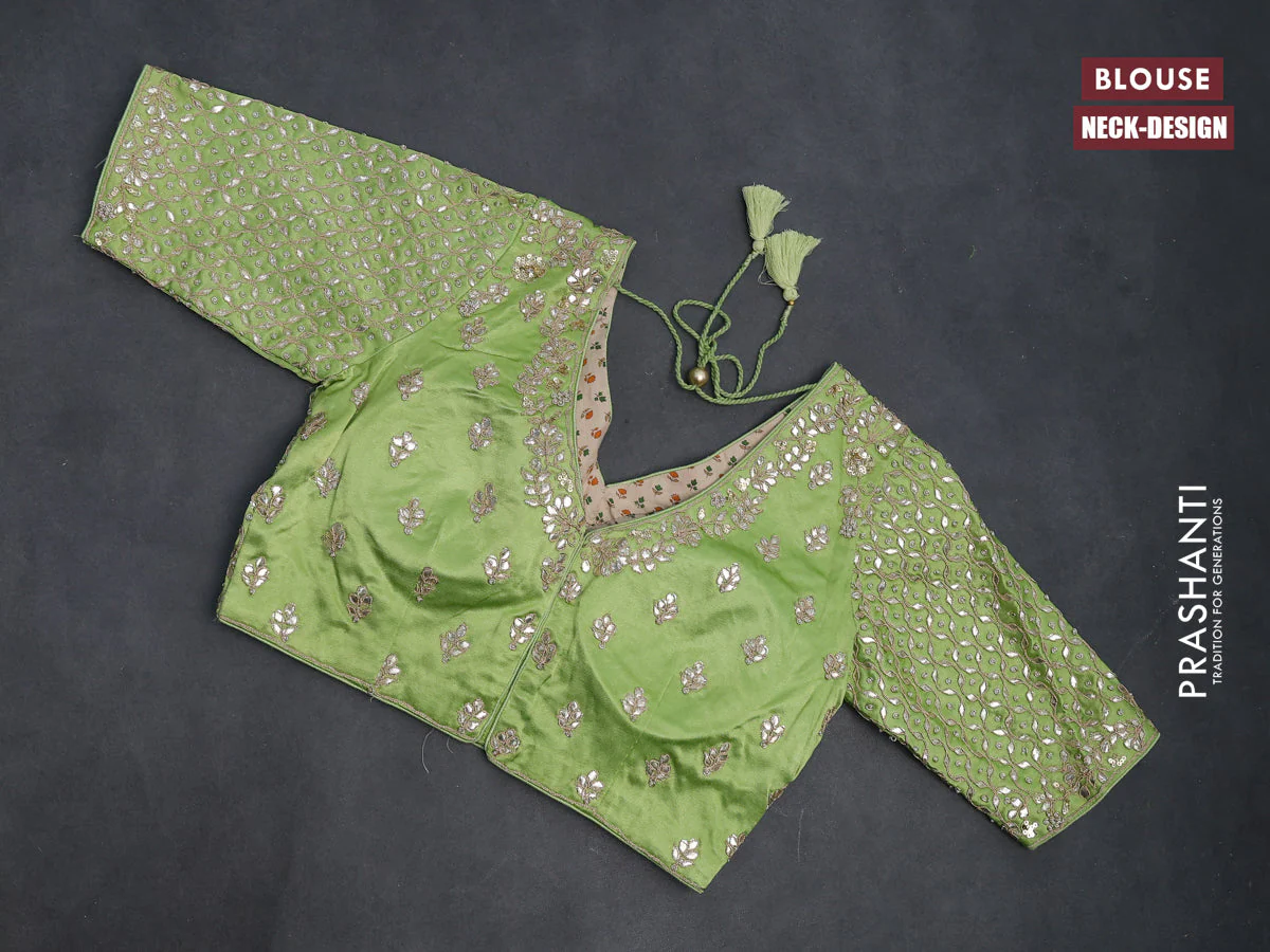 Tissue silk saree light green with allover silver & gold zari weaves and zari woven border - Image 4