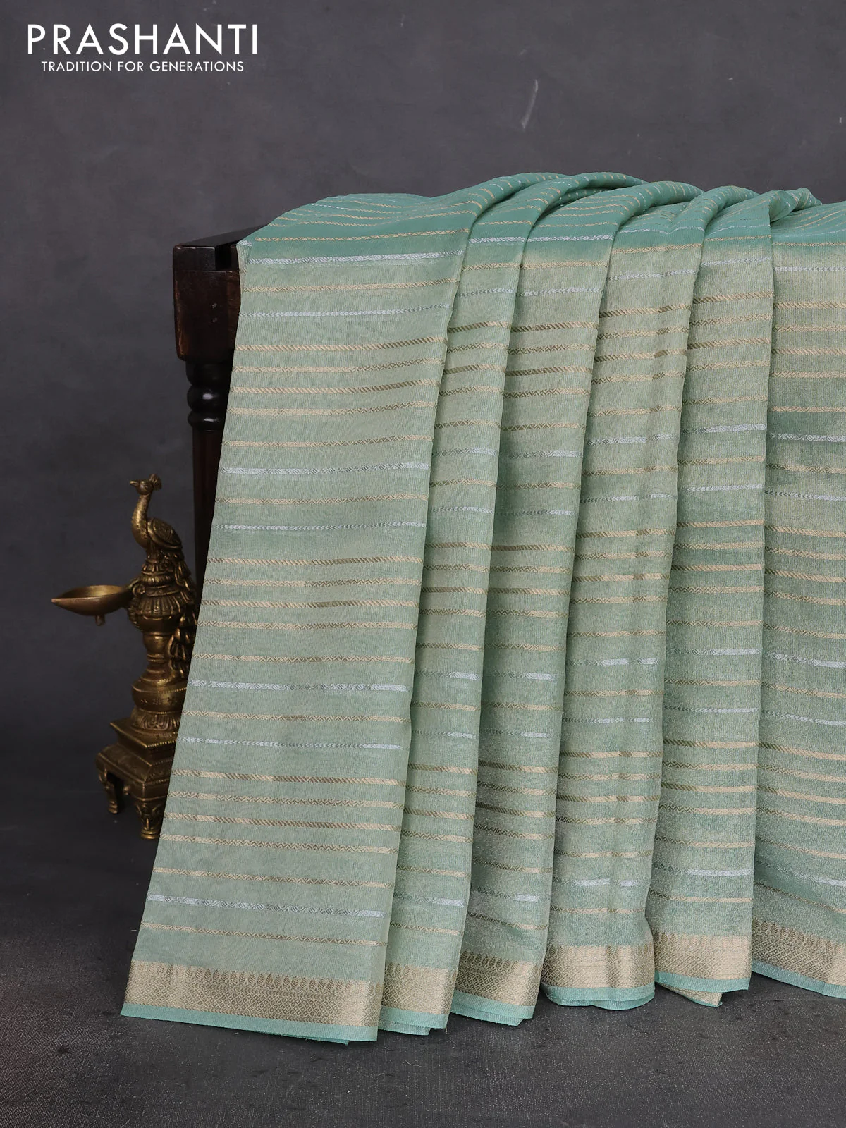 Tissue silk saree pastel green shade with allover silver & gold zari weaves and zari woven border - Image 2
