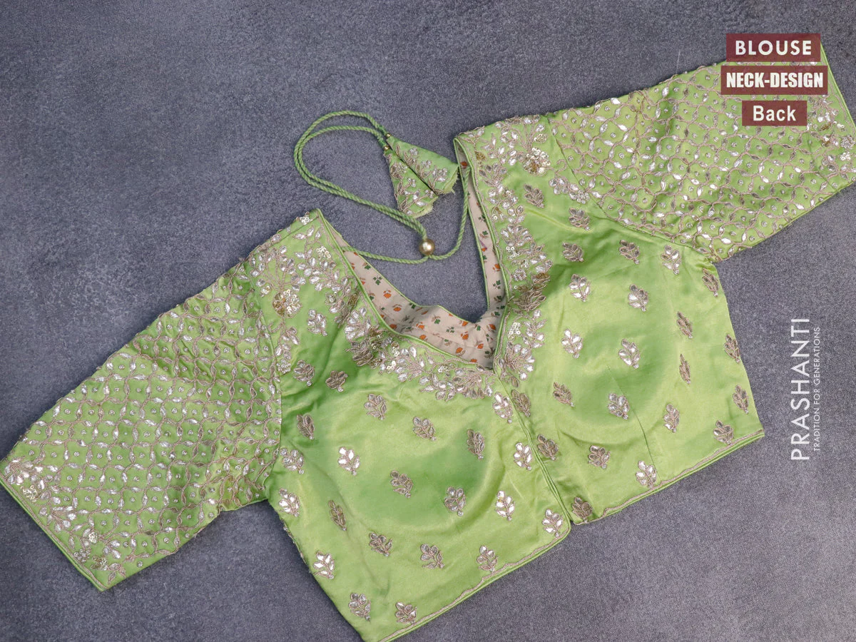 Tissue silk saree pista green with allover silver & zari weaves and zari woven border - Image 11