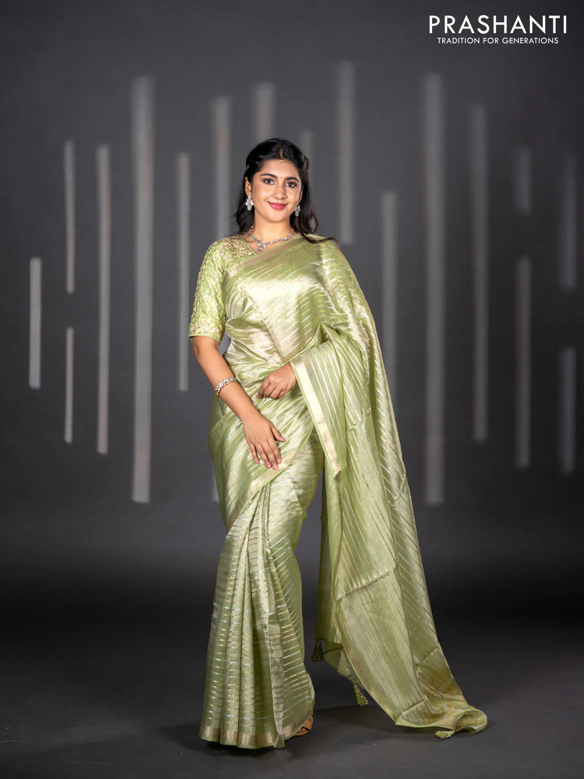 Tissue silk saree pista green with allover silver & zari weaves and zari woven border - Image 3