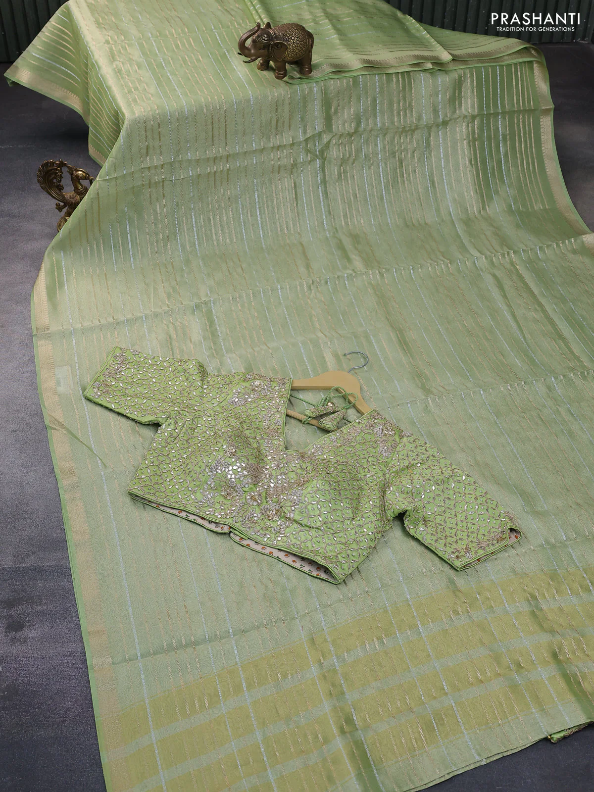 Tissue silk saree pista green with allover silver & zari weaves and zari woven border - Image 8