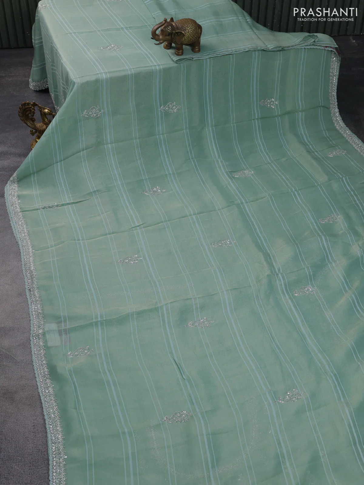 Tissue silk saree teal blue with embroidery work buttas and sequin & beaded work border - Image 2