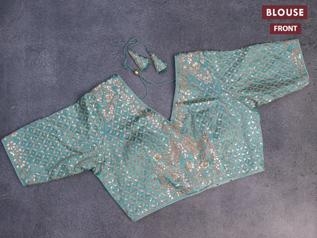 Tissue silk saree teal shade with allover silver & zari weaves and zari woven border - Image 10