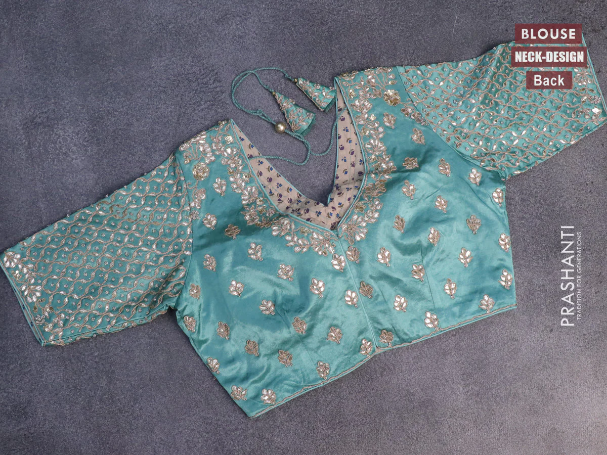 Tissue silk saree teal shade with allover silver & zari weaves and zari woven border - Image 11