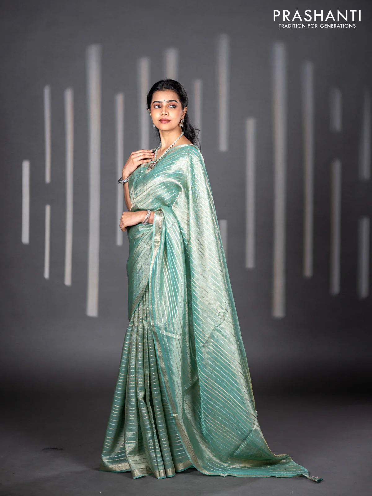 Tissue silk saree teal shade with allover silver & zari weaves and zari woven border - Image 3