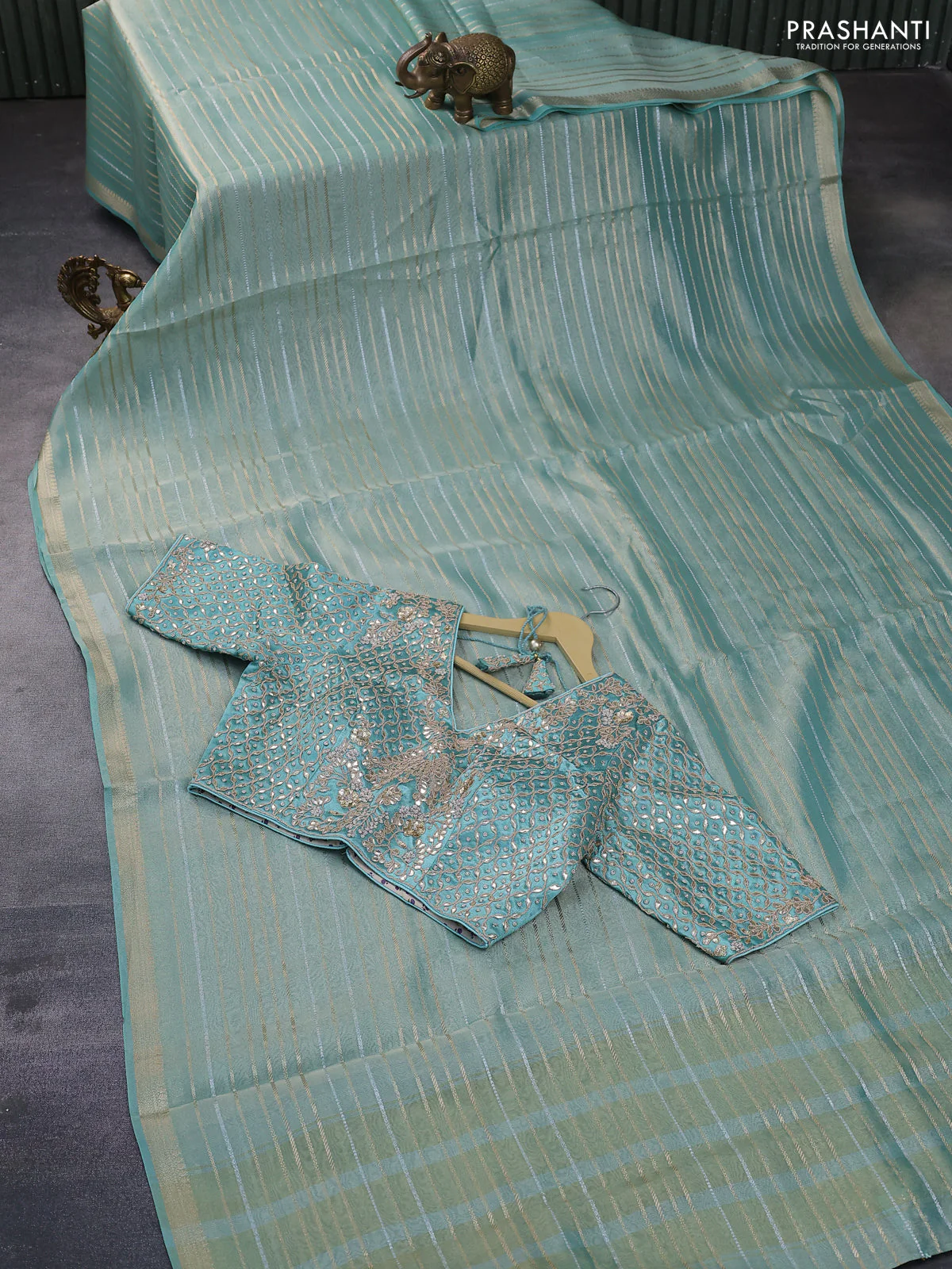 Tissue silk saree teal shade with allover silver & zari weaves and zari woven border - Image 8