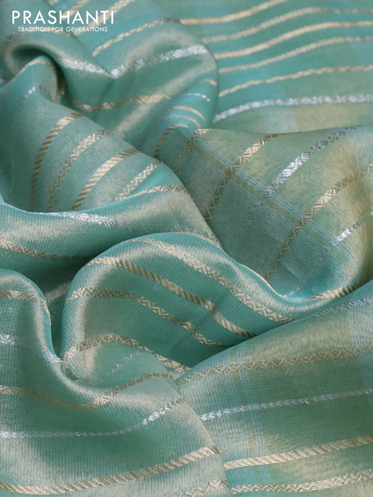Tissue silk saree teal shade with allover silver & zari weaves and zari woven border - Image 9
