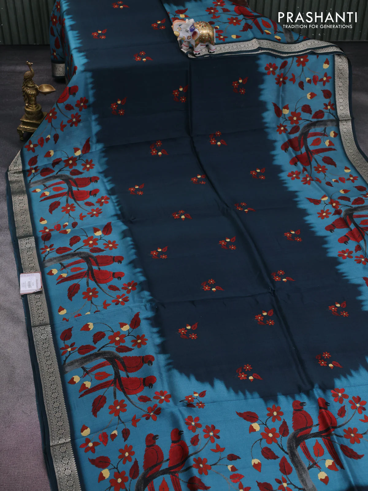 Tussar georgette silk saree peacock blue and pastel blue with allover digital prints and zari woven border - Image 2