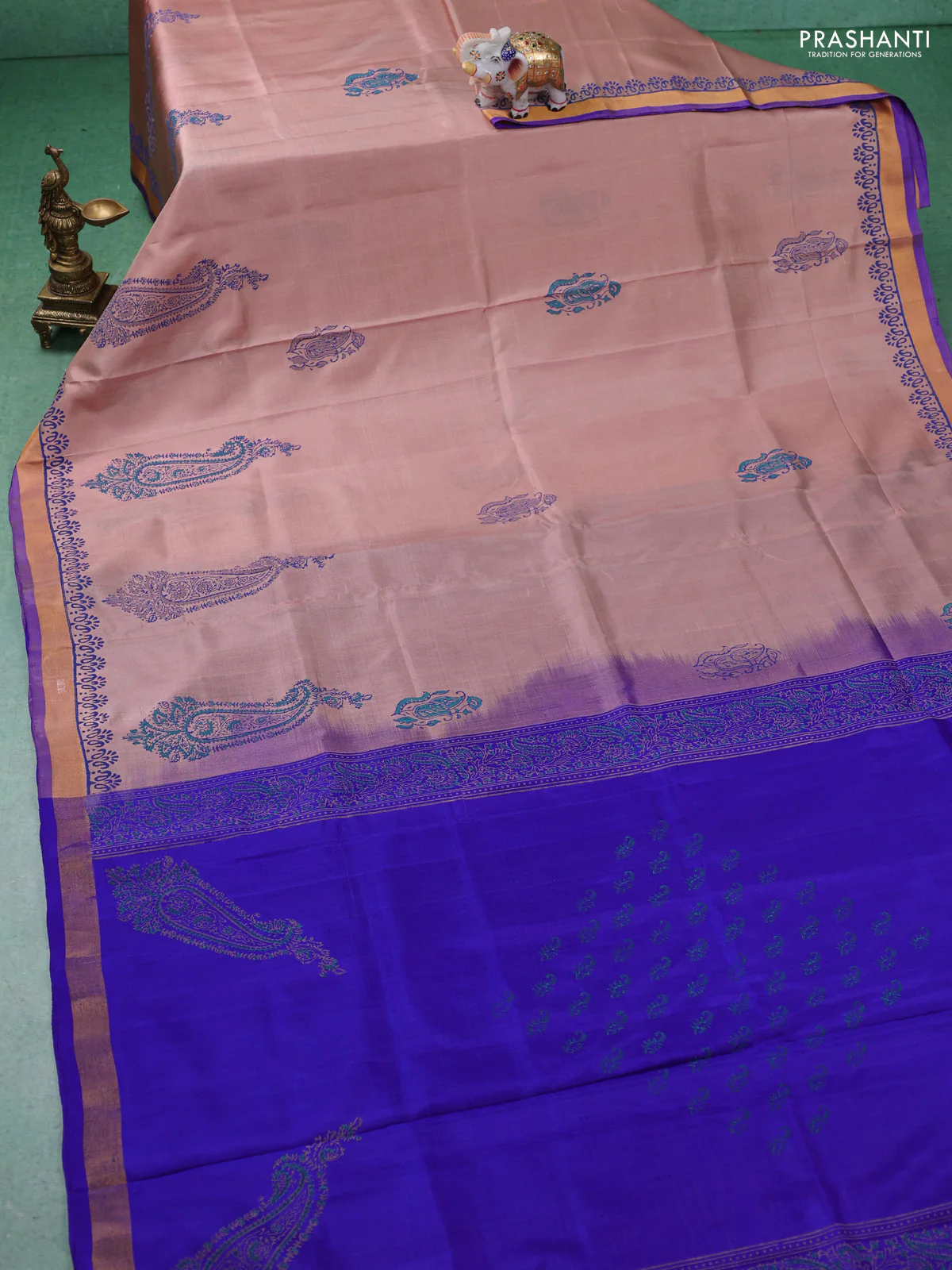 Uppada block printed partly silk saree beige and blue with paisly prints and zari woven border - Image 2