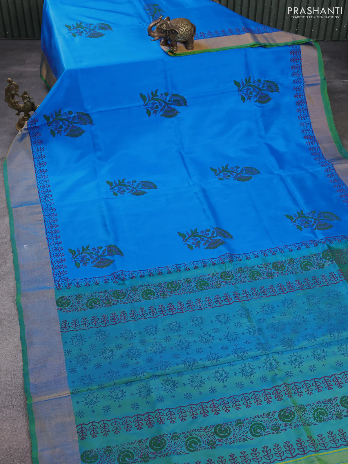 Uppada block printed silk saree cs blue and dual shade of blueish green with floral butta prints and zari woven border - Image 2
