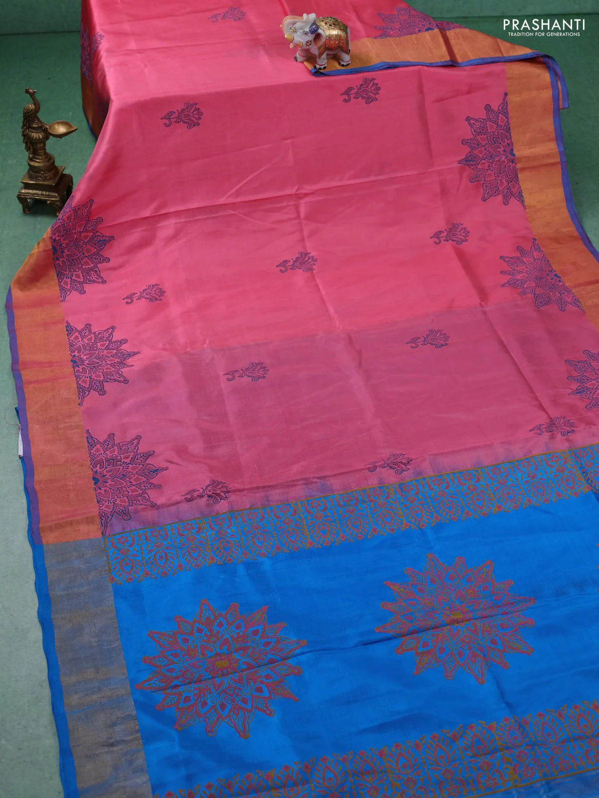 Uppada block printed silk saree peach pink and cs blue with floral prints and zari woven border - Image 2