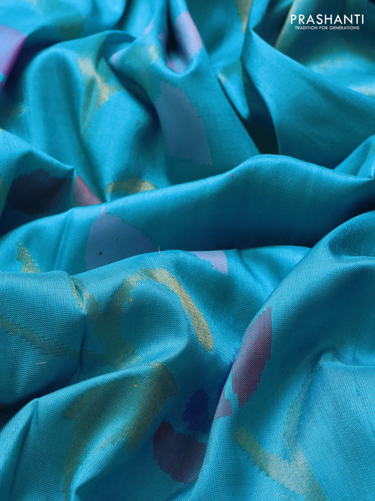Uppada jamdhani silk saree teal blue with allover floral jamdhani weaves and zari woven border - Image 3