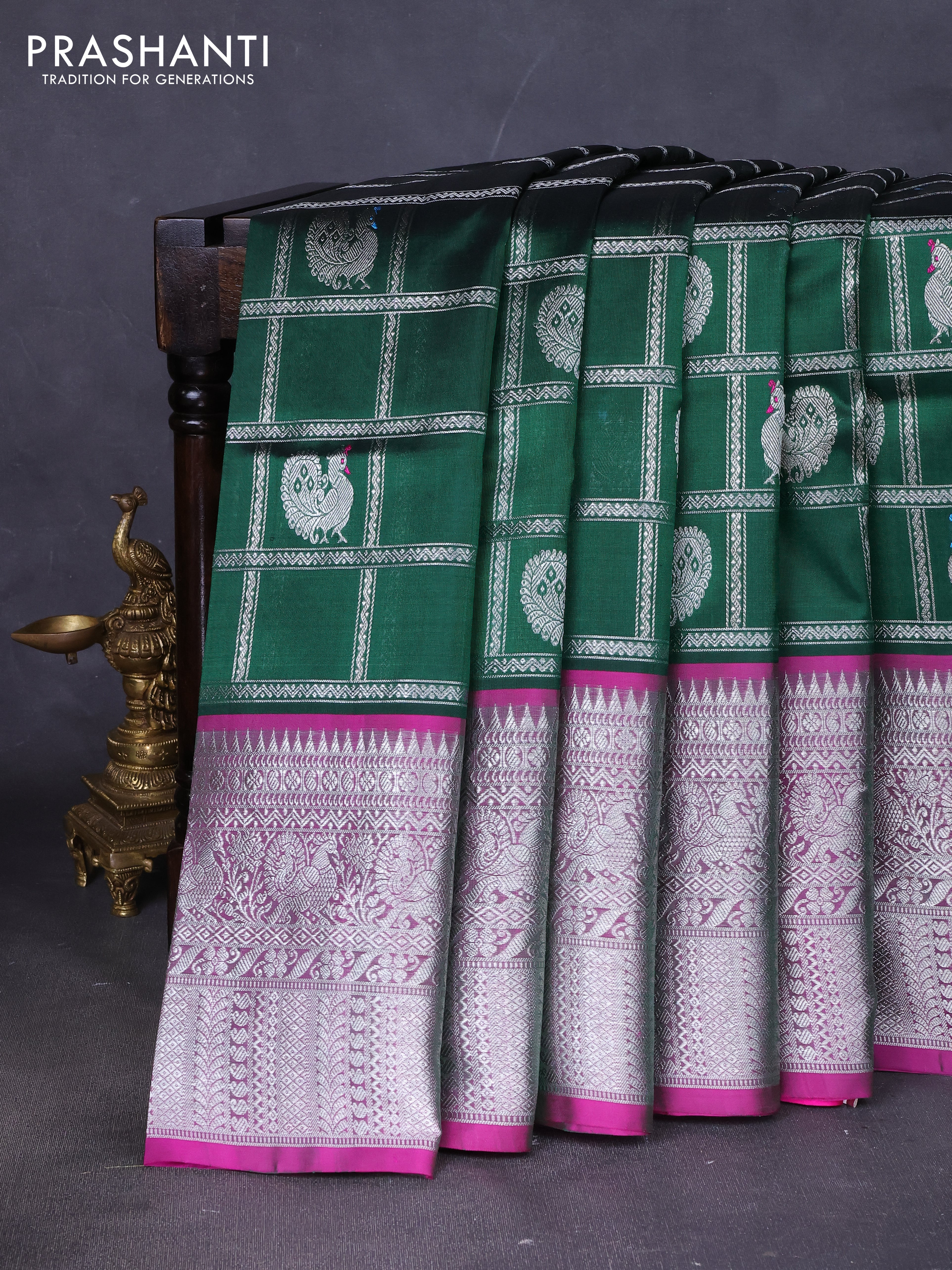Venkatagiri silk saree bottle green and pink with allover silver zari checks & annam buttas and long silver zari woven border