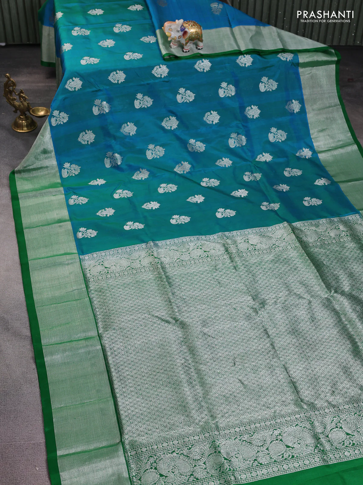Venkatagiri silk saree dual shade of cs blue and green with silver zari woven buttas and silver zari woven border - Image 2