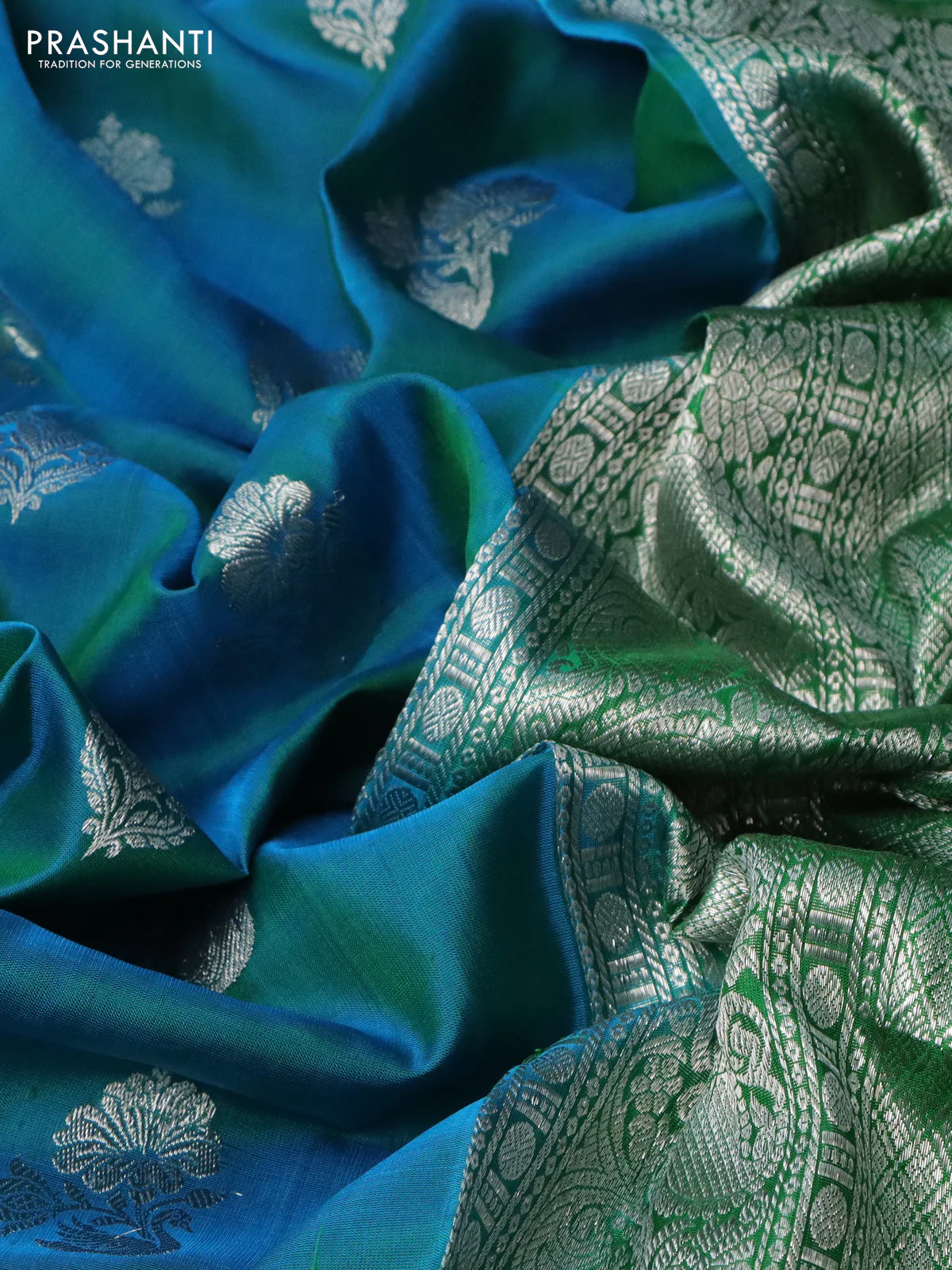 Venkatagiri silk saree dual shade of cs blue and green with silver zari woven buttas and silver zari woven border - Image 3