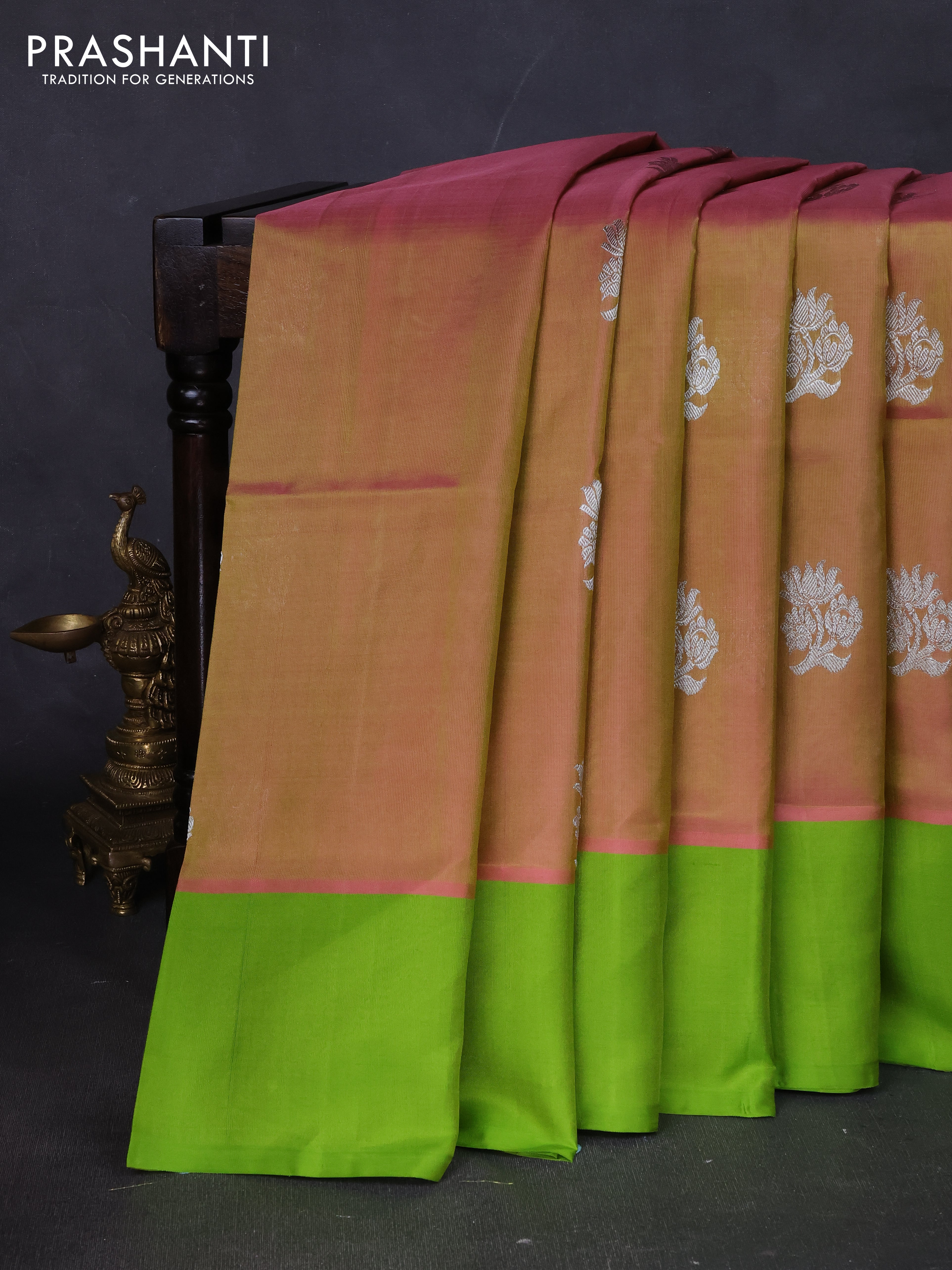 Venkatagiri silk saree dual shade of peach shade and light green with silver zari woven floral buttas and simple border