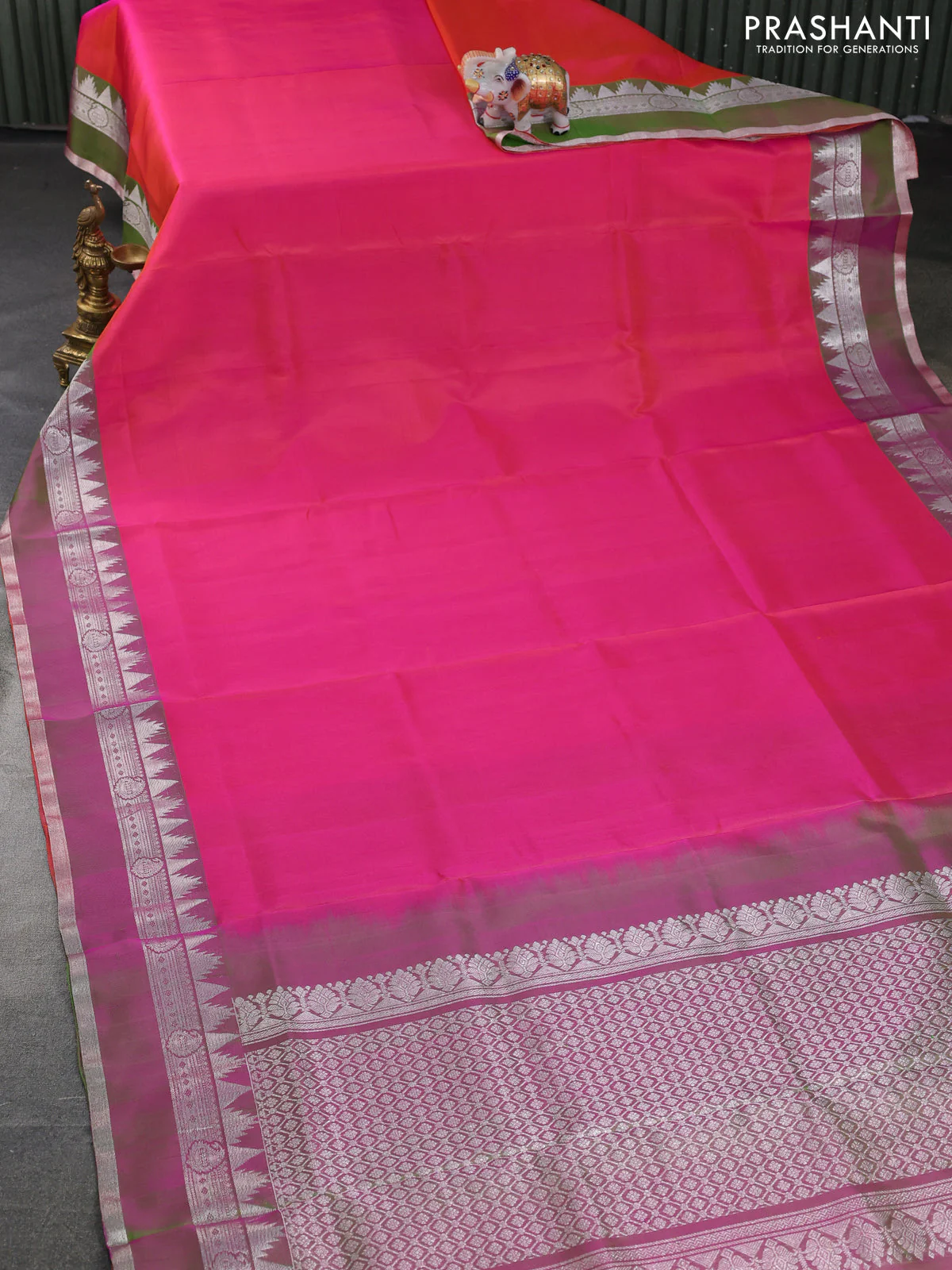 Venkatagiri silk saree dual shade of pinkish orange and dual shade of green with plain body and rettapet silver zari woven border - Image 2