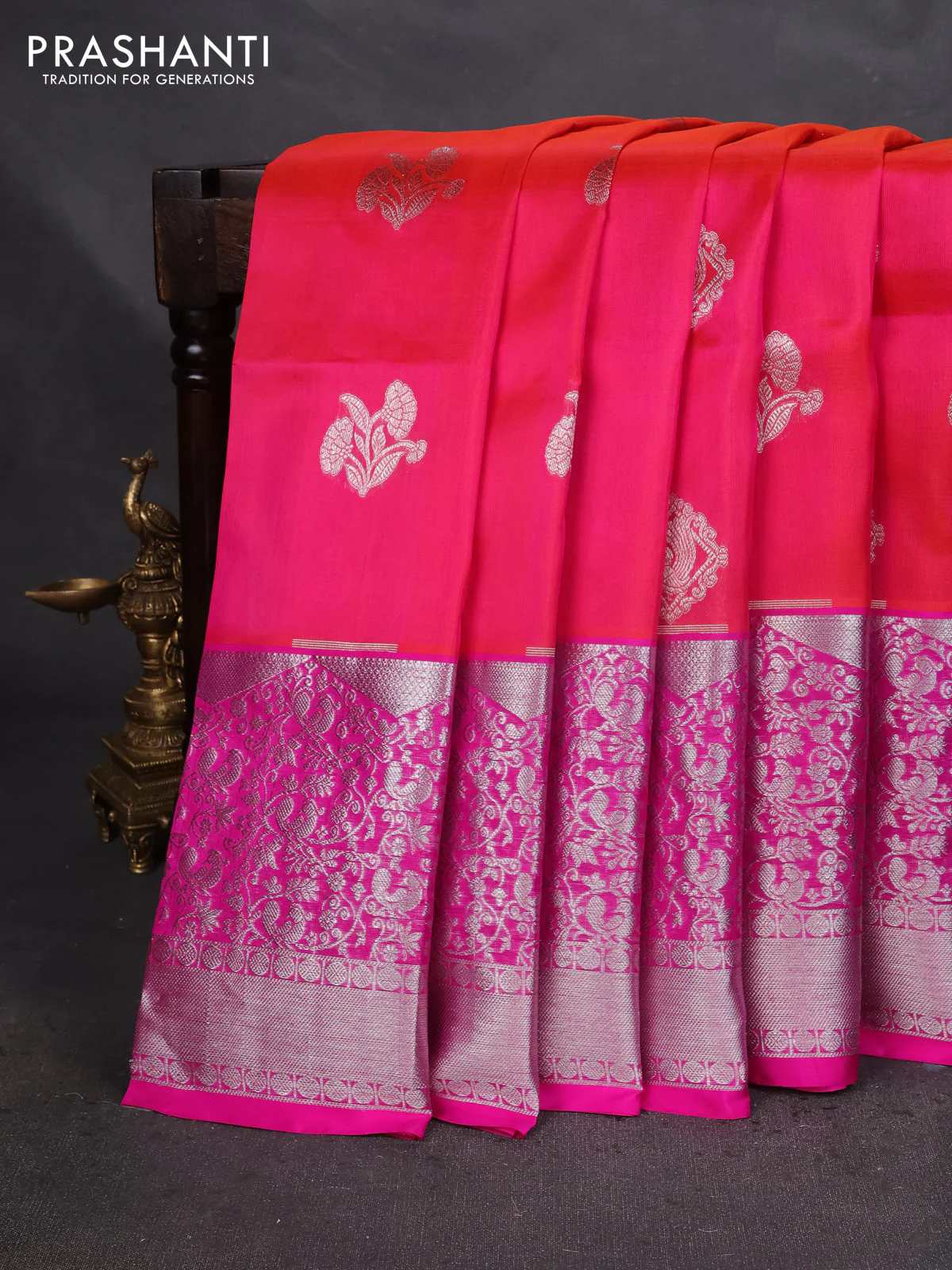 Venkatagiri silk saree dual shade of pinkish orange and pink with silver zari woven buttas and long zari woven border