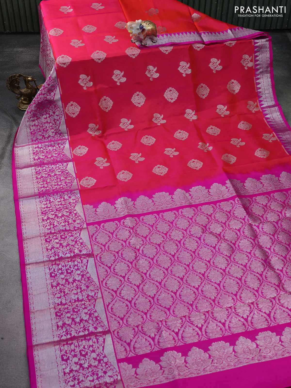Venkatagiri silk saree dual shade of pinkish orange and pink with silver zari woven buttas and long zari woven border - Image 2