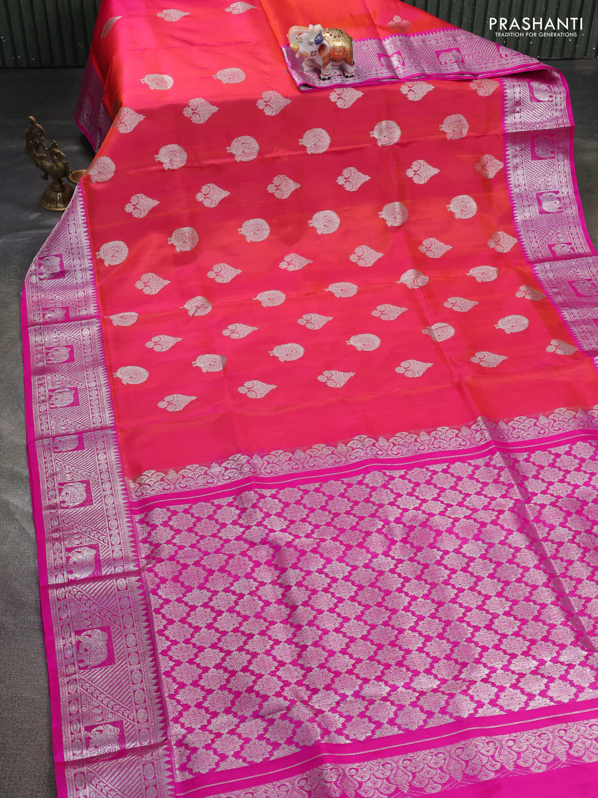 Venkatagiri silk saree dual shade of pinkish orange and pink with silver zari woven buttas and silver zari woven border - Image 2