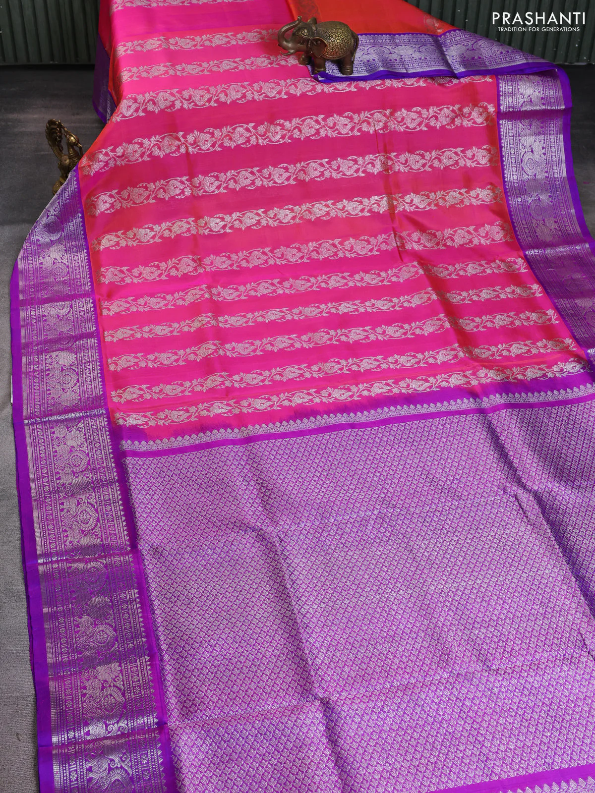 Venkatagiri silk saree dual shade of pinkish orange and purple with allover silver zari weaves and silver zari woven border - Image 2
