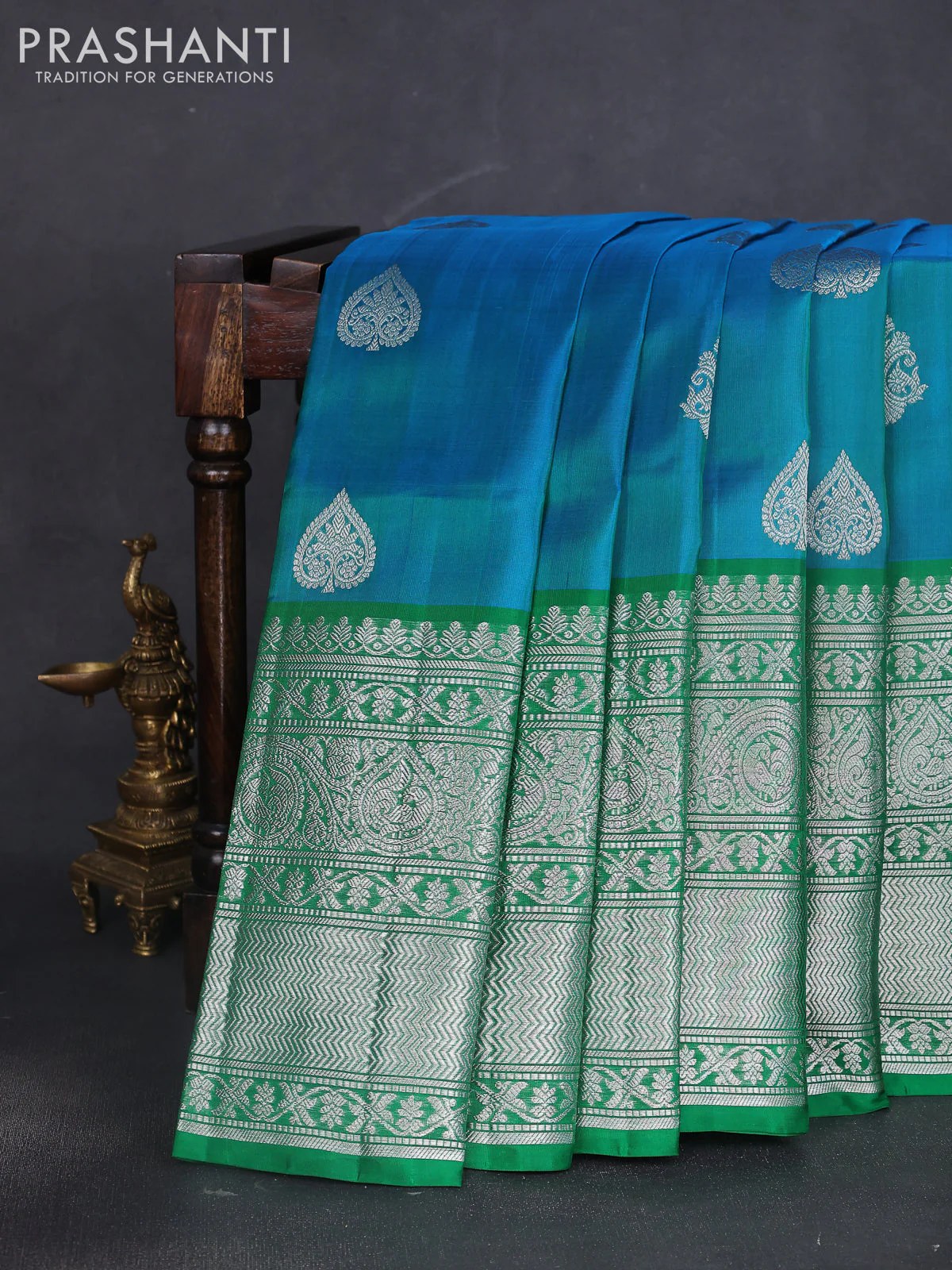 Venkatagiri silk saree dual shade of teal blue and green with silver zari woven buttas and long silver zari woven border