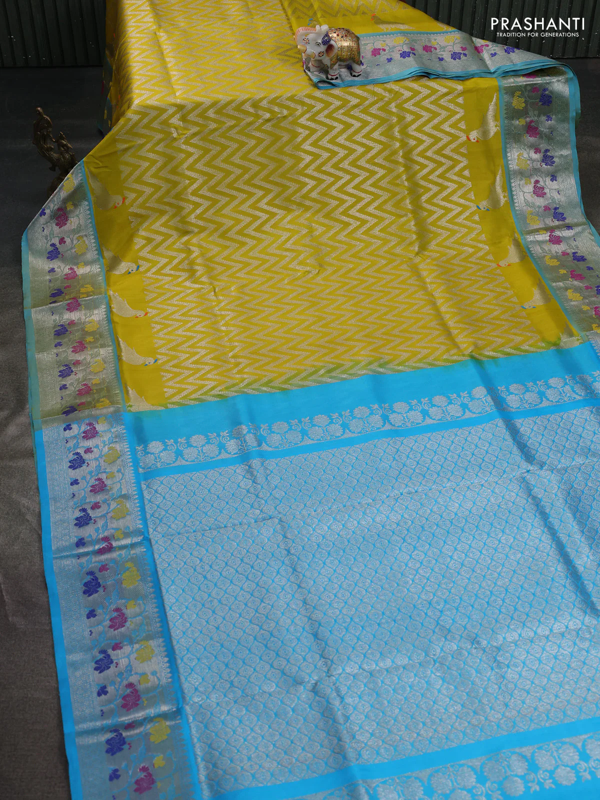 Venkatagiri silk saree lime yellow and light blue with allover zig zag silver zari weaves and silver zari woven floral design border - Image 6
