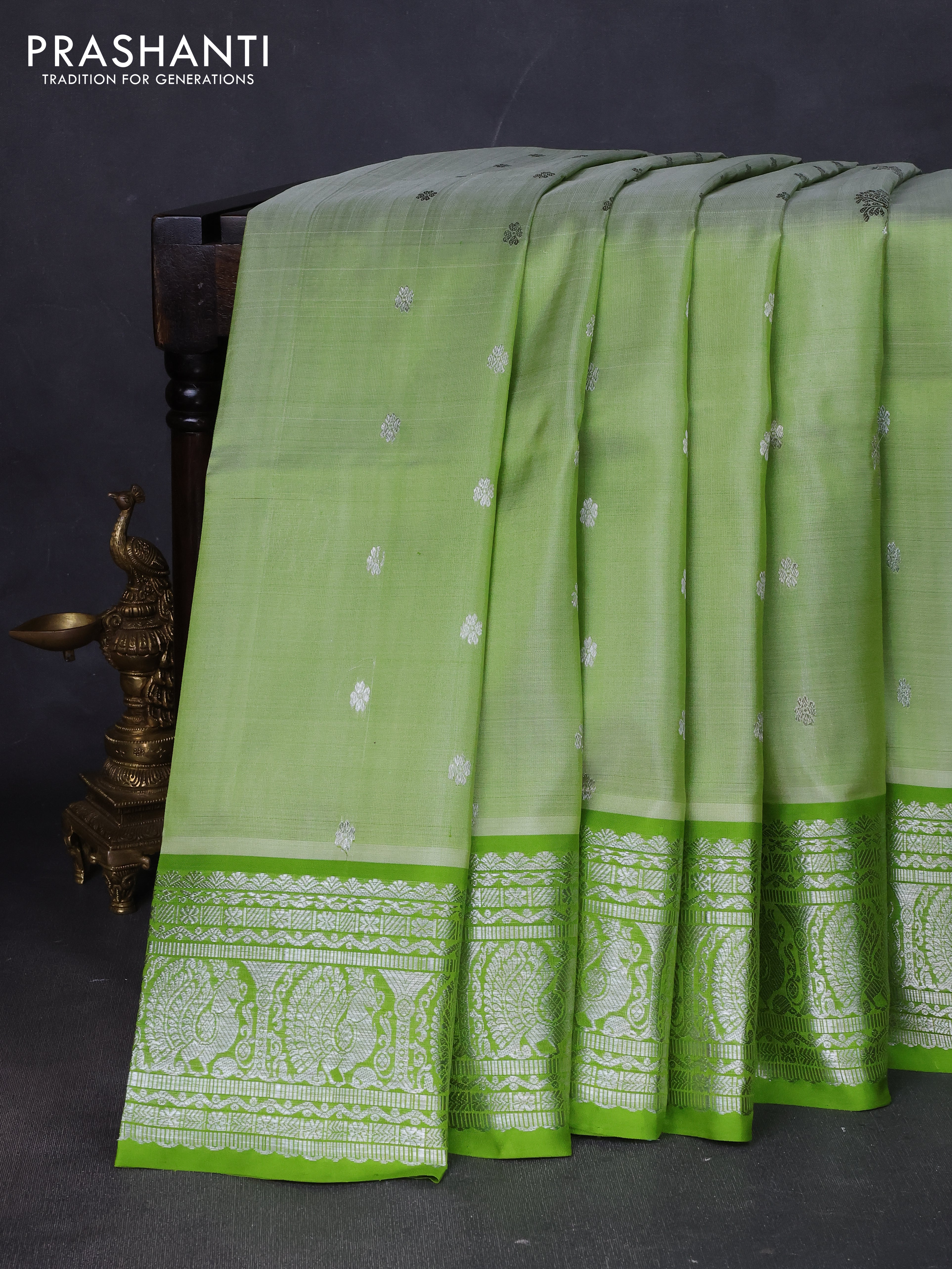 Venkatagiri silk saree pista green and light green with silver zari woven buttas and silver zari woven border