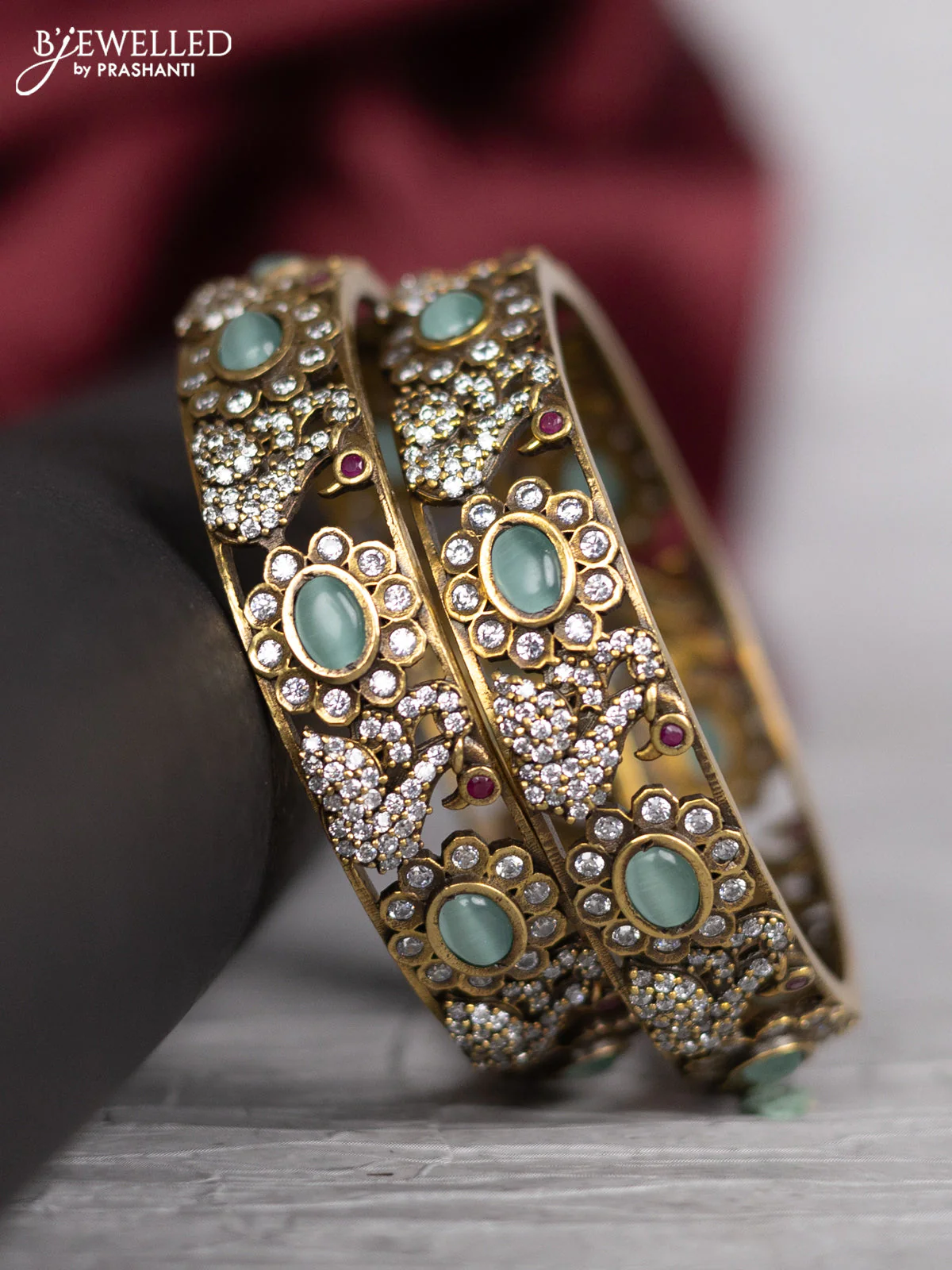 Victorian finish bangle swan design with mint green and cz stones