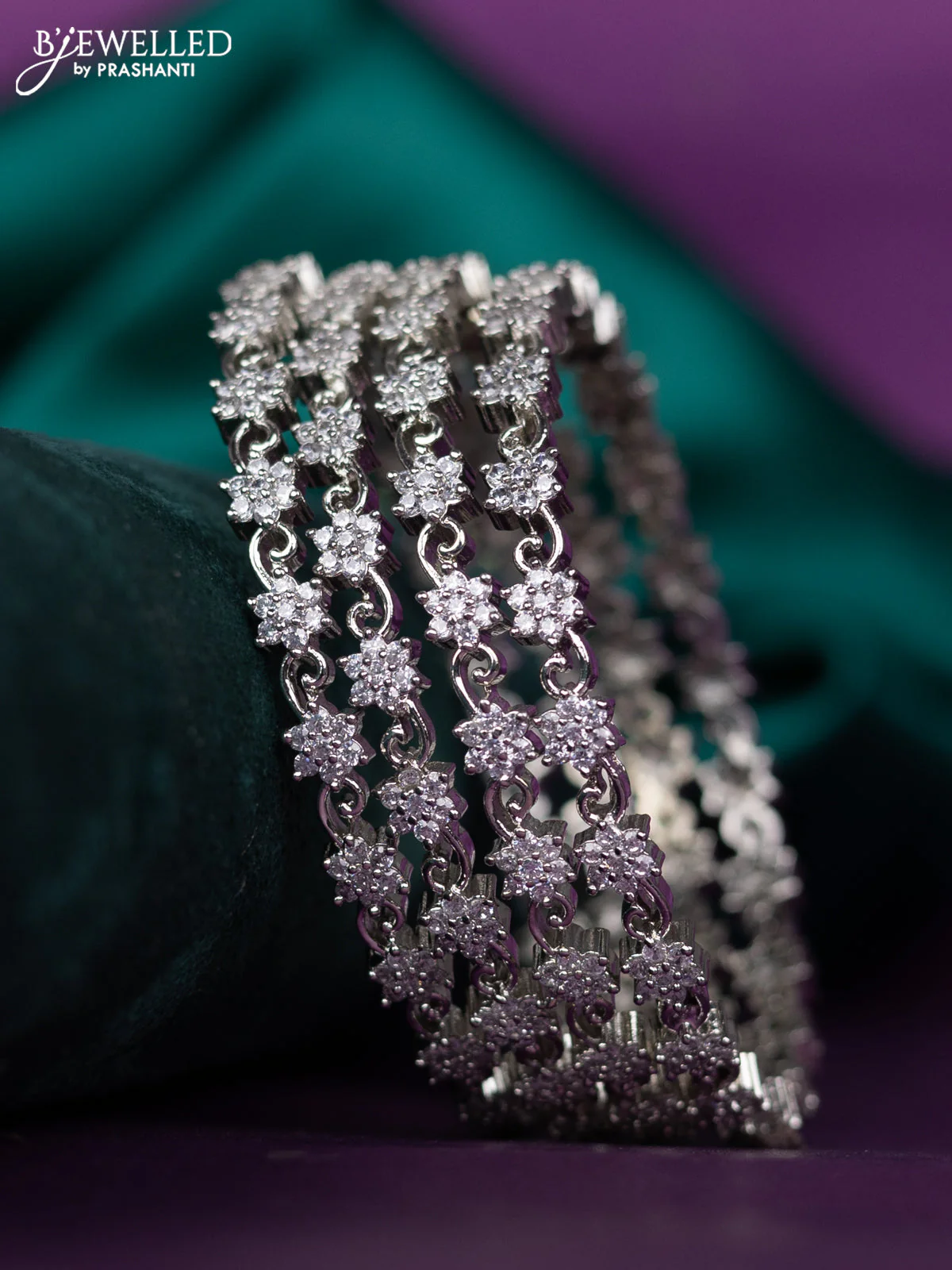 zircon bangle floral design with cz stones