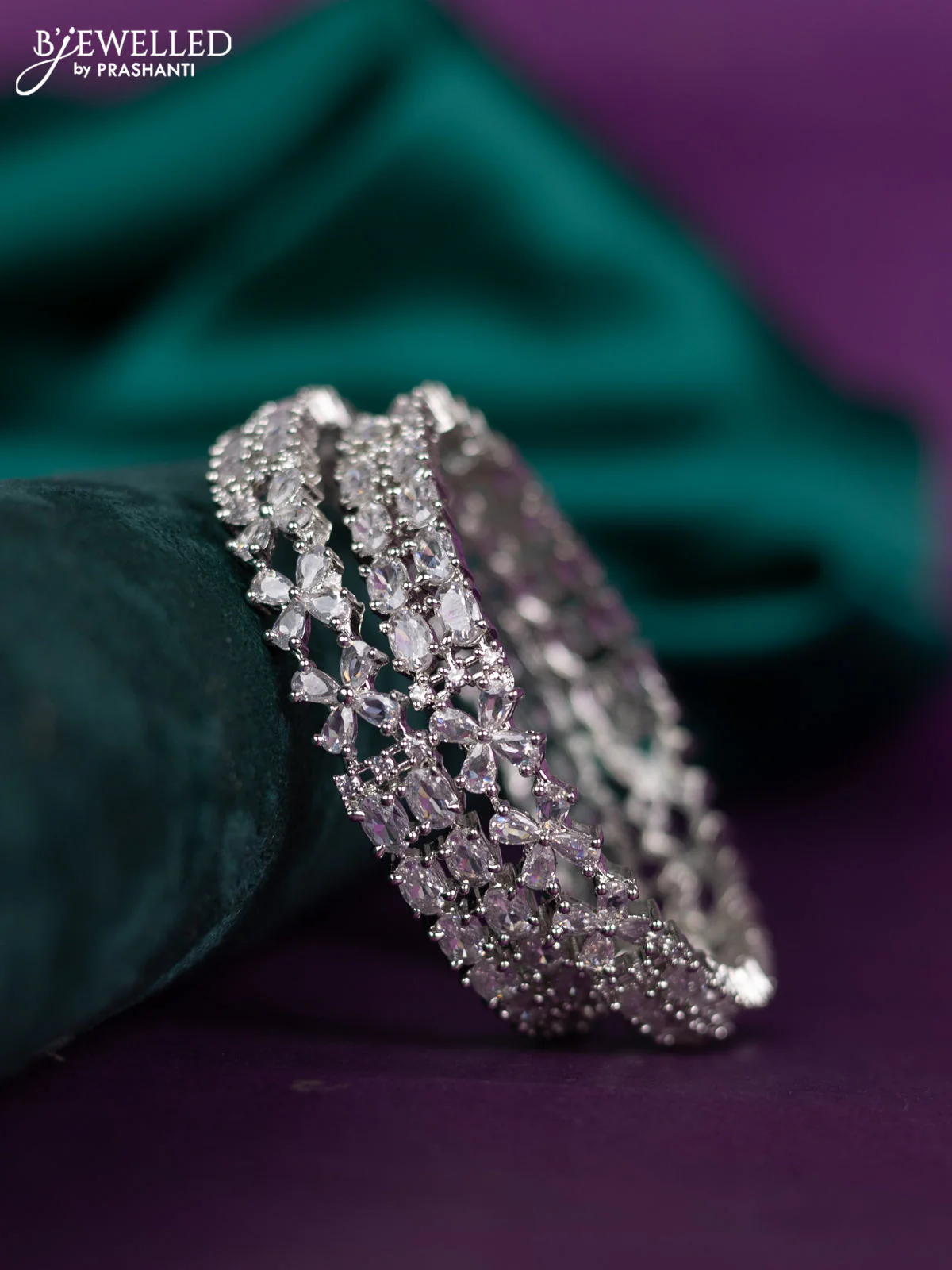 zircon bangle floral design with cz stones