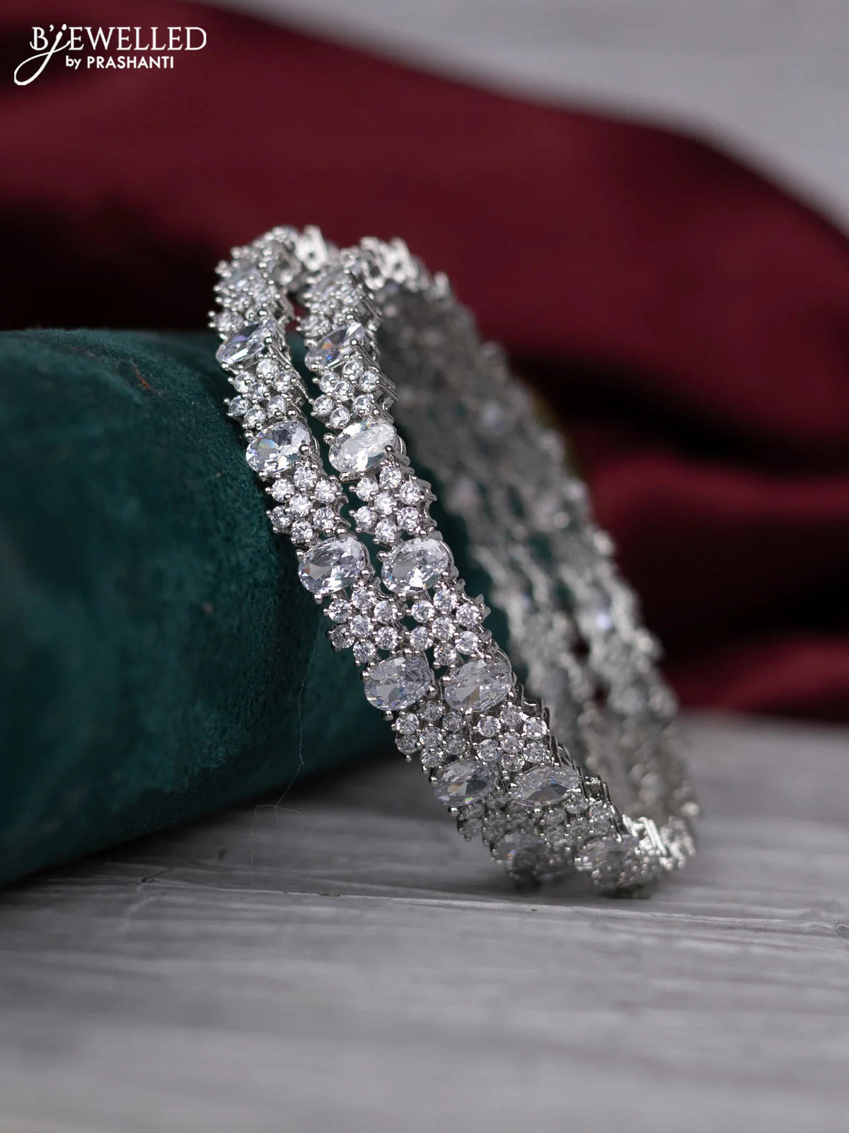 zircon bangle floral design with cz stones